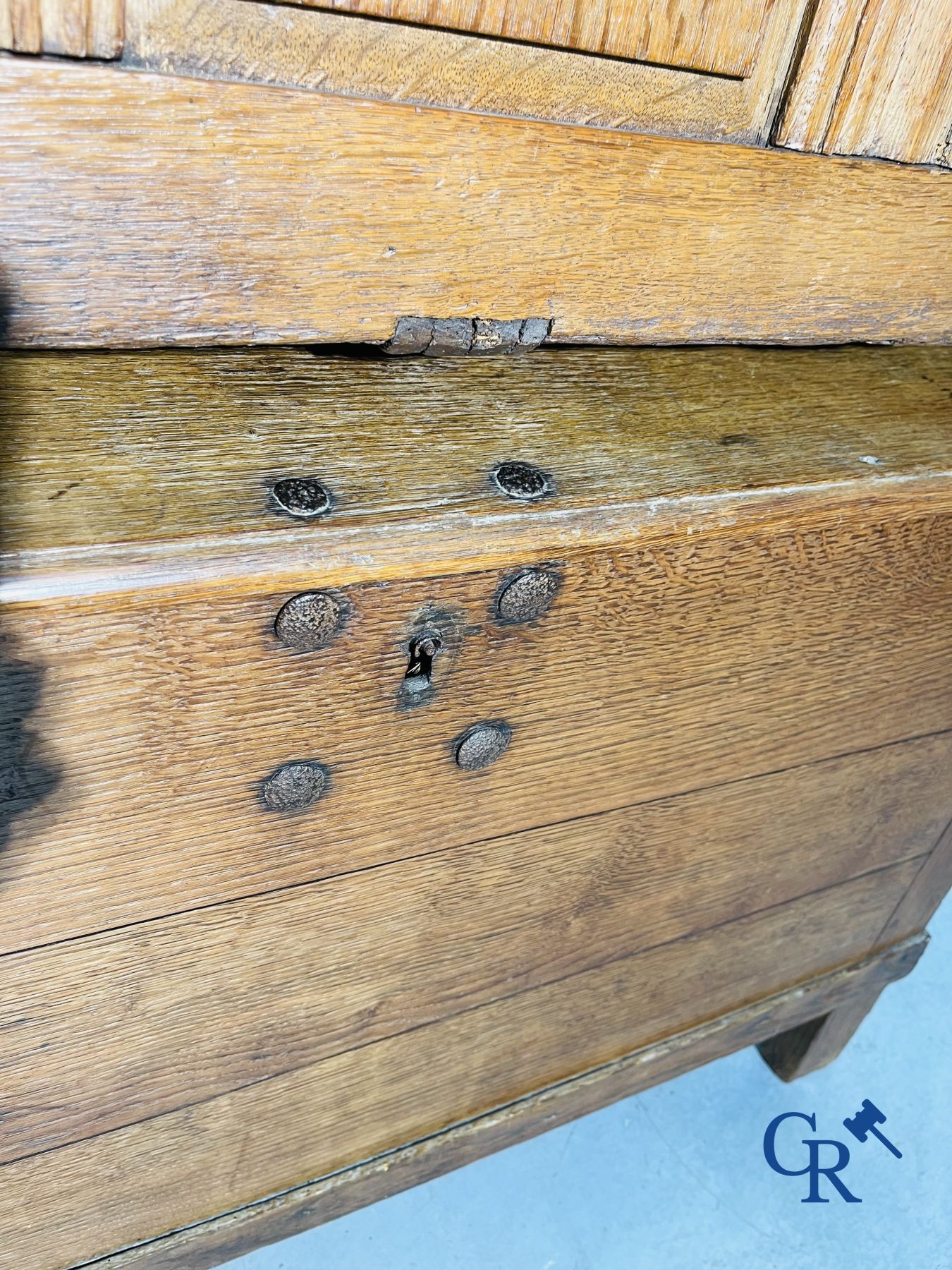 2 oak chests and an antique cast iron fireplace plate.