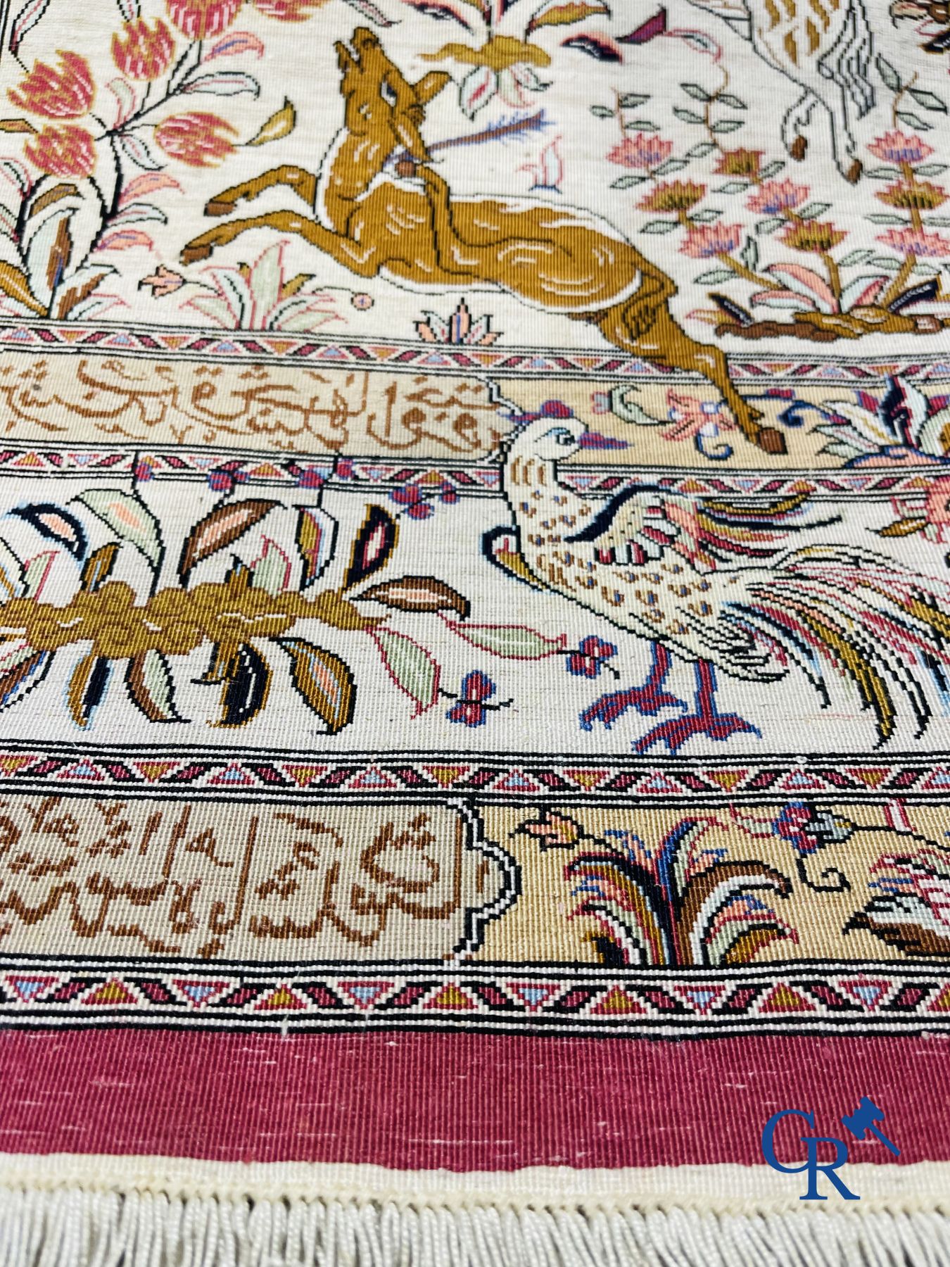 Oriental carpets: Iran, Ghoum. Signed Persian carpet in silk with a hunting decor.