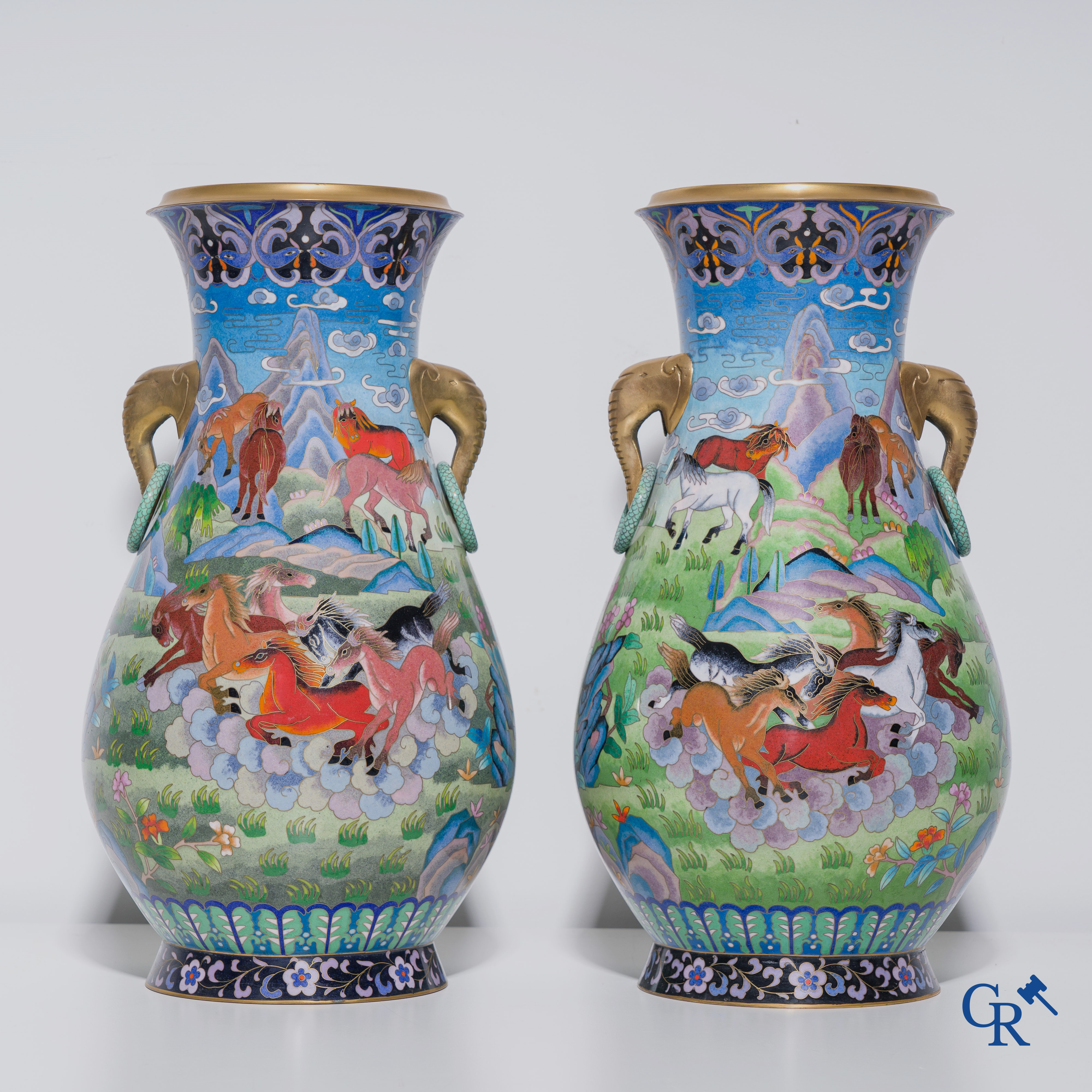 A pair of vases in Chinese cloisonné enamel with a decor of horses, circa 1980.