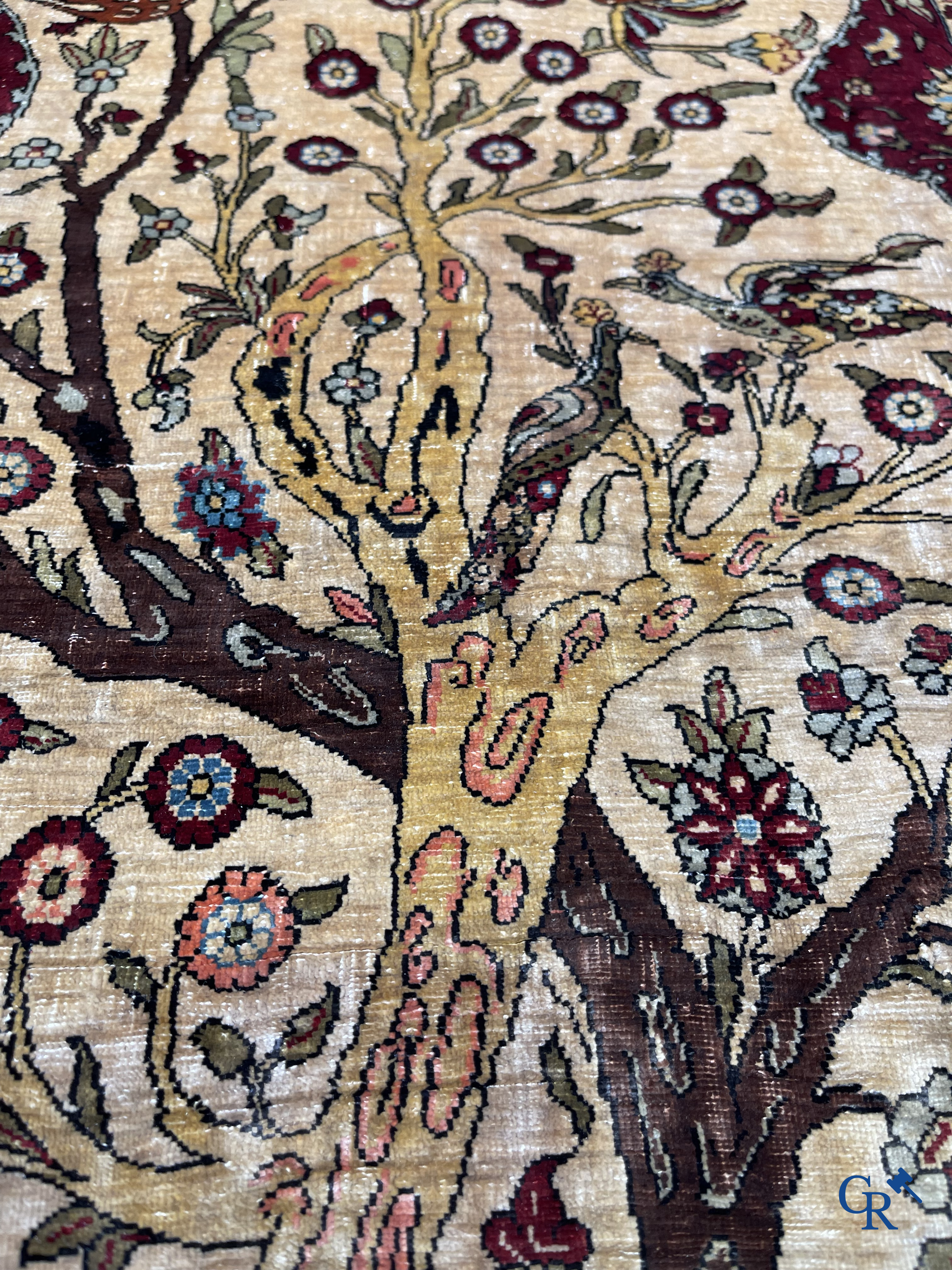 Oriental carpets, Hereke, a finely hand-knotted and signed silk carpet with a tree of life.