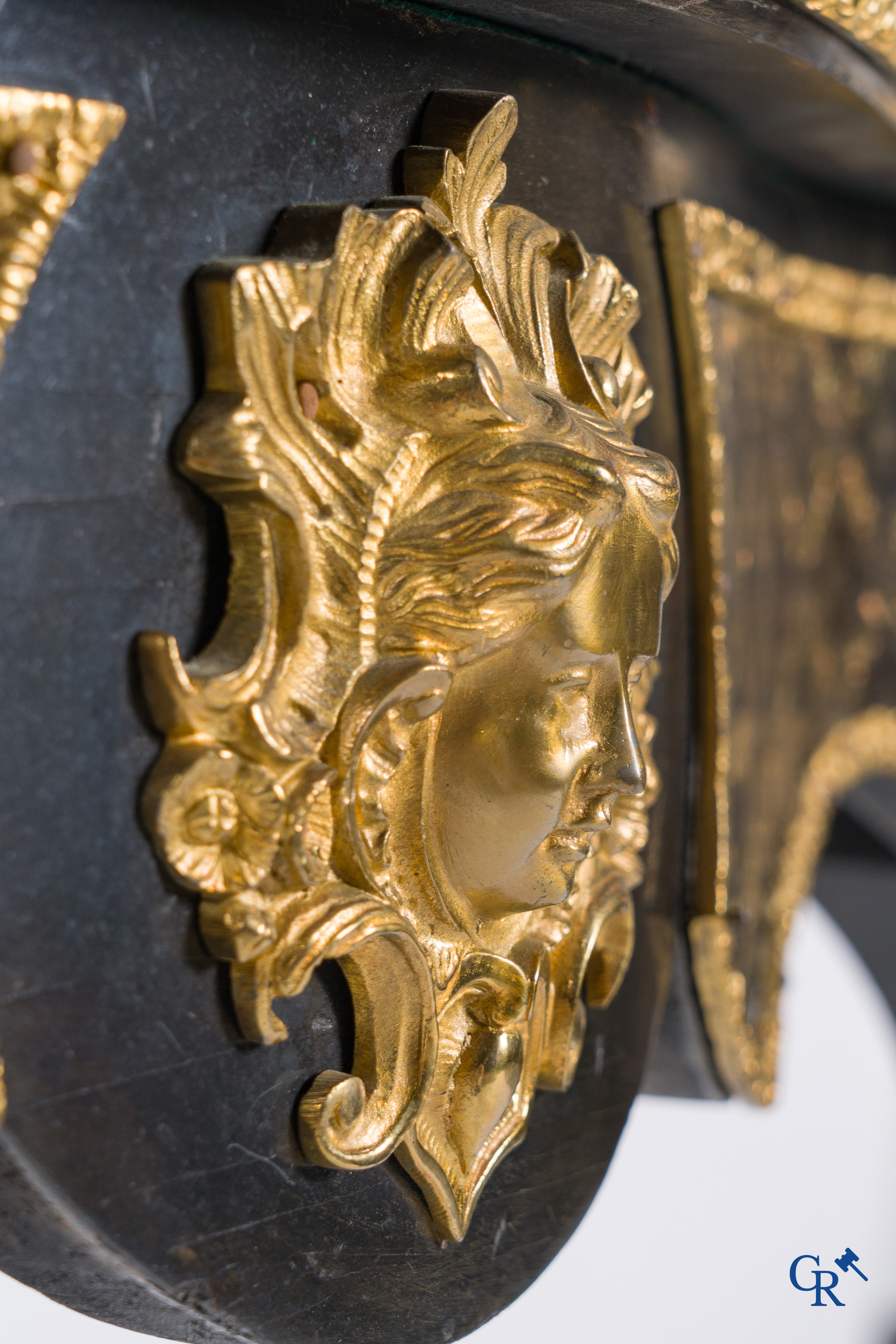 A card table with finely gilded bronze ornaments and inlay of copper and mother-of-pearl, circa 1880.