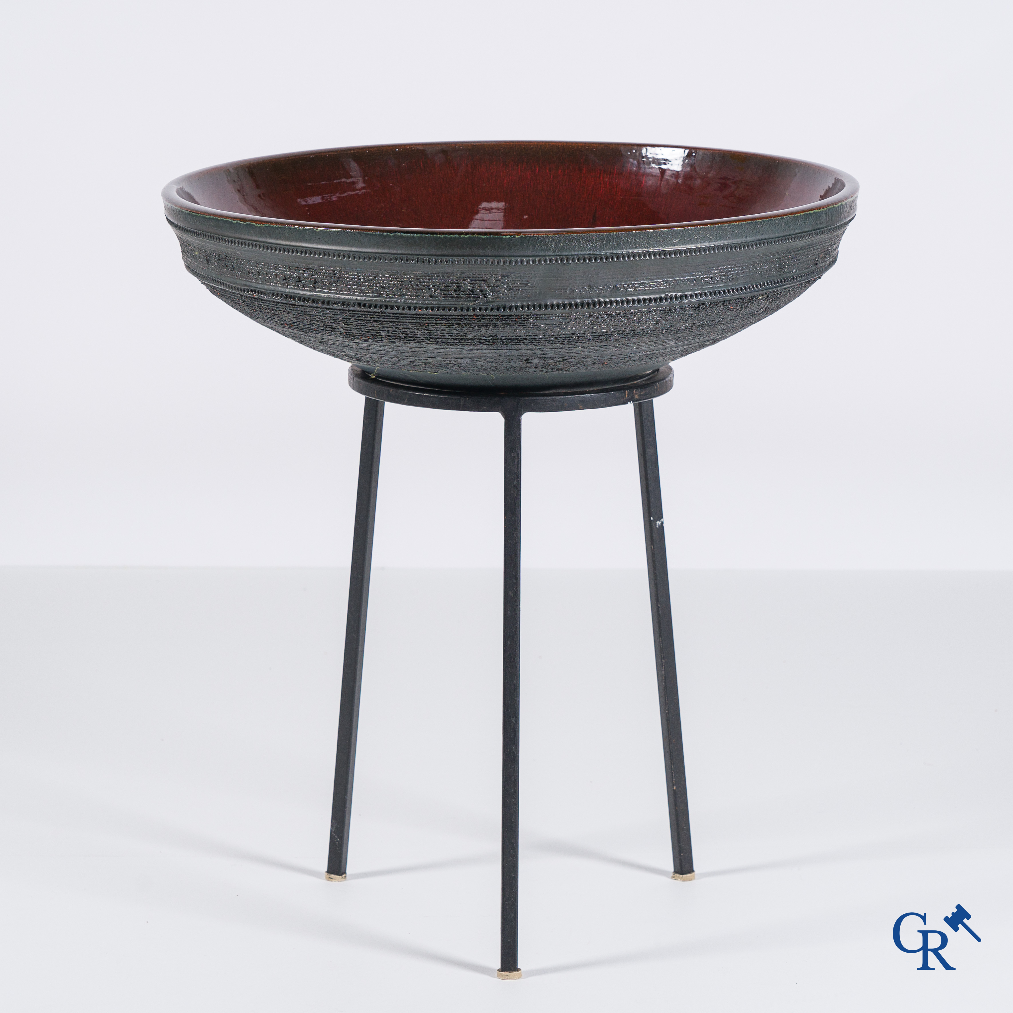 Elizabeth Vandeweghe for Perignem Amphora. A large bowl in glazed ceramic on a wrought iron stand.