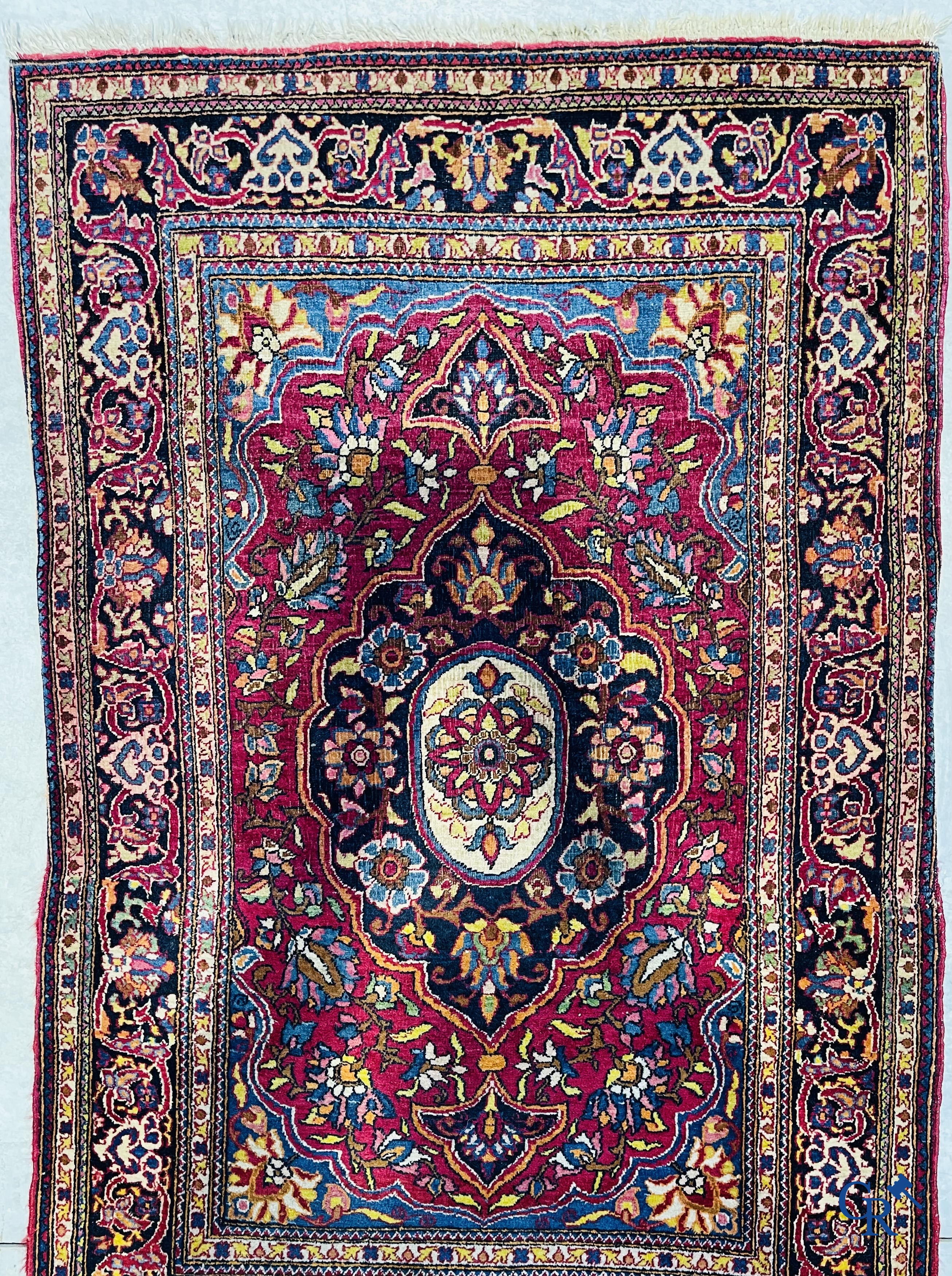 Persian carpets: A lot of 2 finely knotted Oriental carpets. Floral decor and floral decor with birds of paradise.