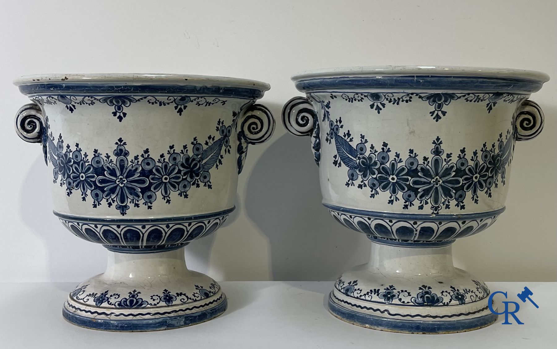 Delft: 11 pieces of blue and white faience with different décors. 17th - 18th century.