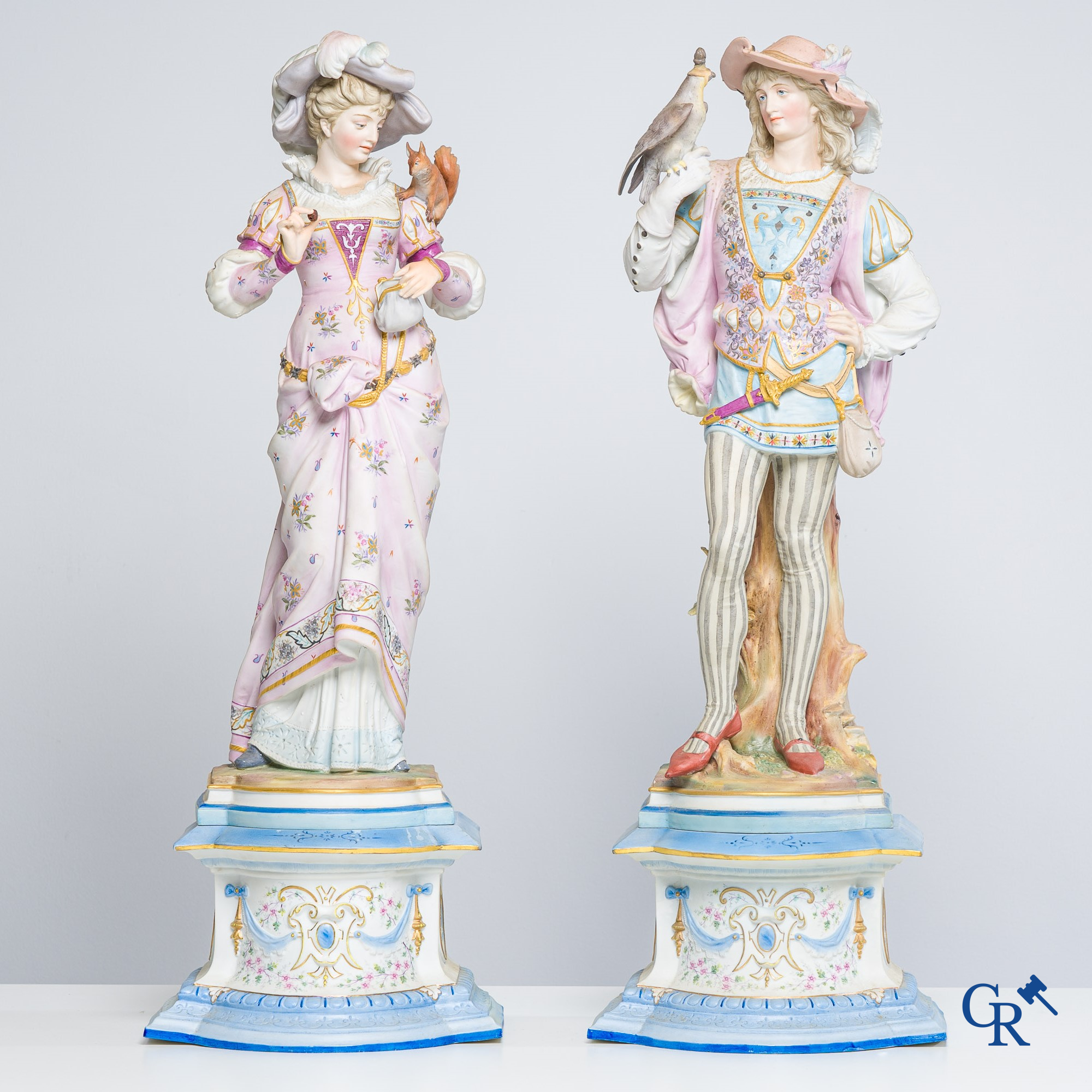 Exceptional pair of large statues in coloured and gilded biscuit porcelain. 2nd half of the 19th century.