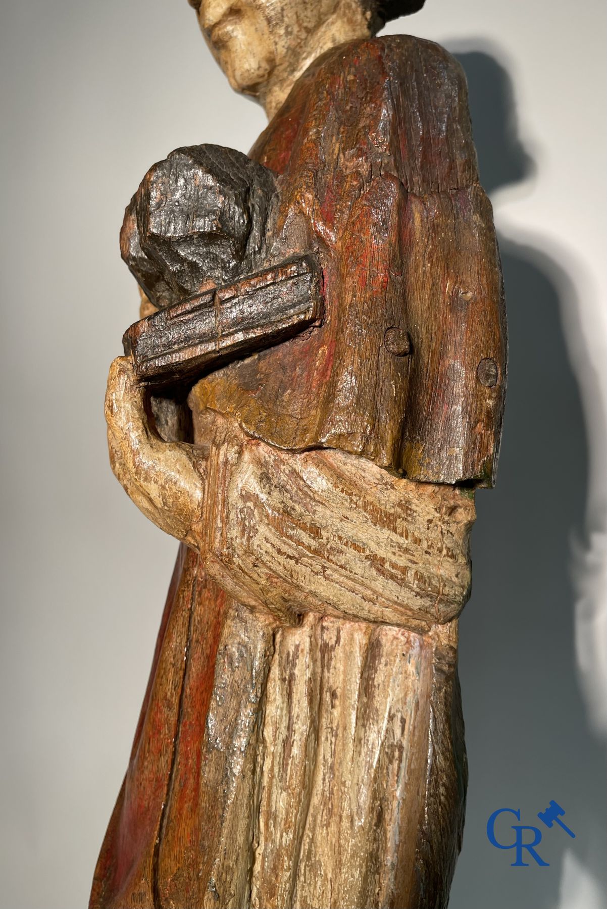 Wooden sculpture: Polychrome wood sculpture of a saint. Saint Stephen. Probably 17th century.