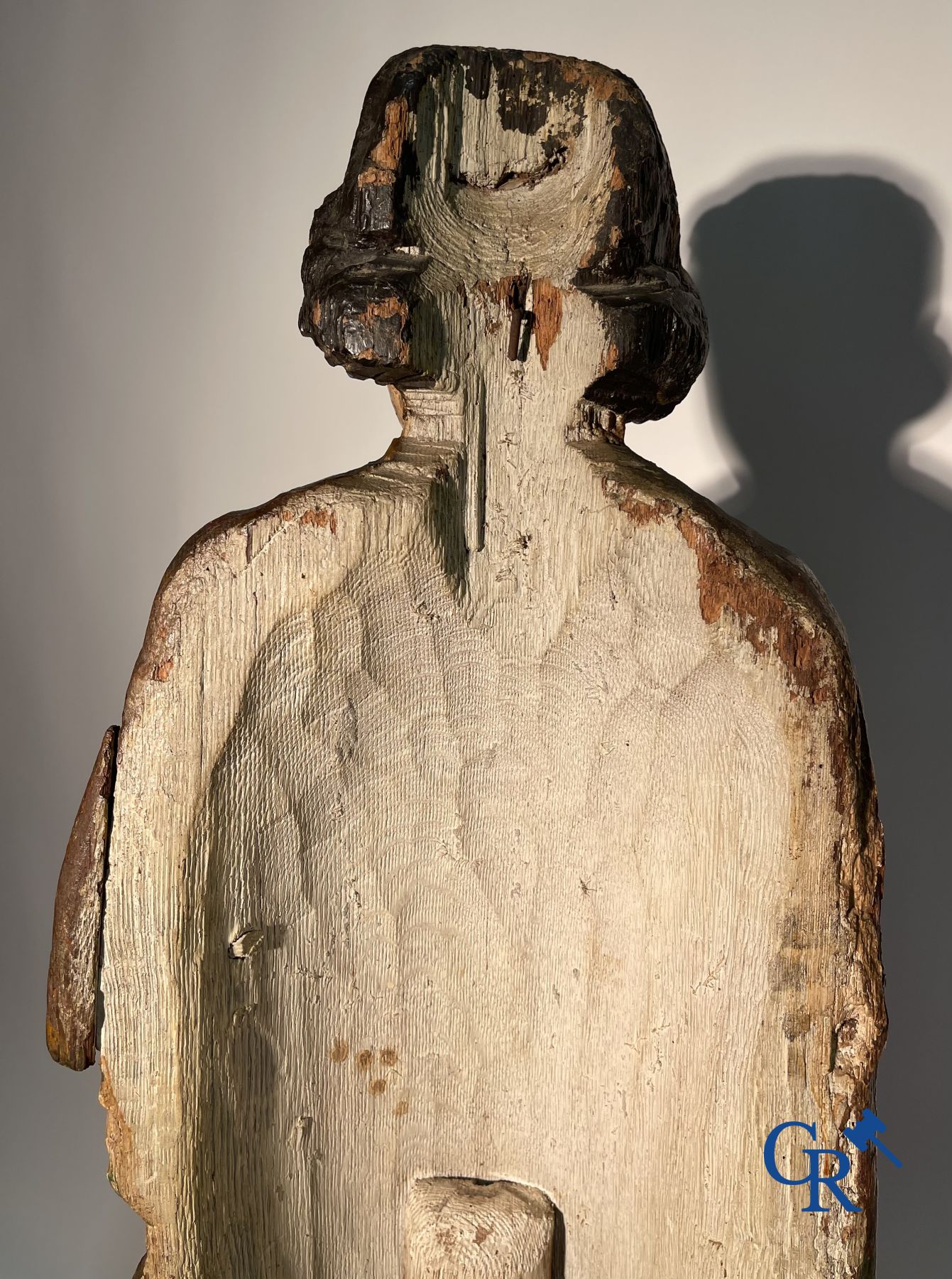 Wooden sculpture: Polychrome wood sculpture of a saint. Saint Stephen. Probably 17th century.