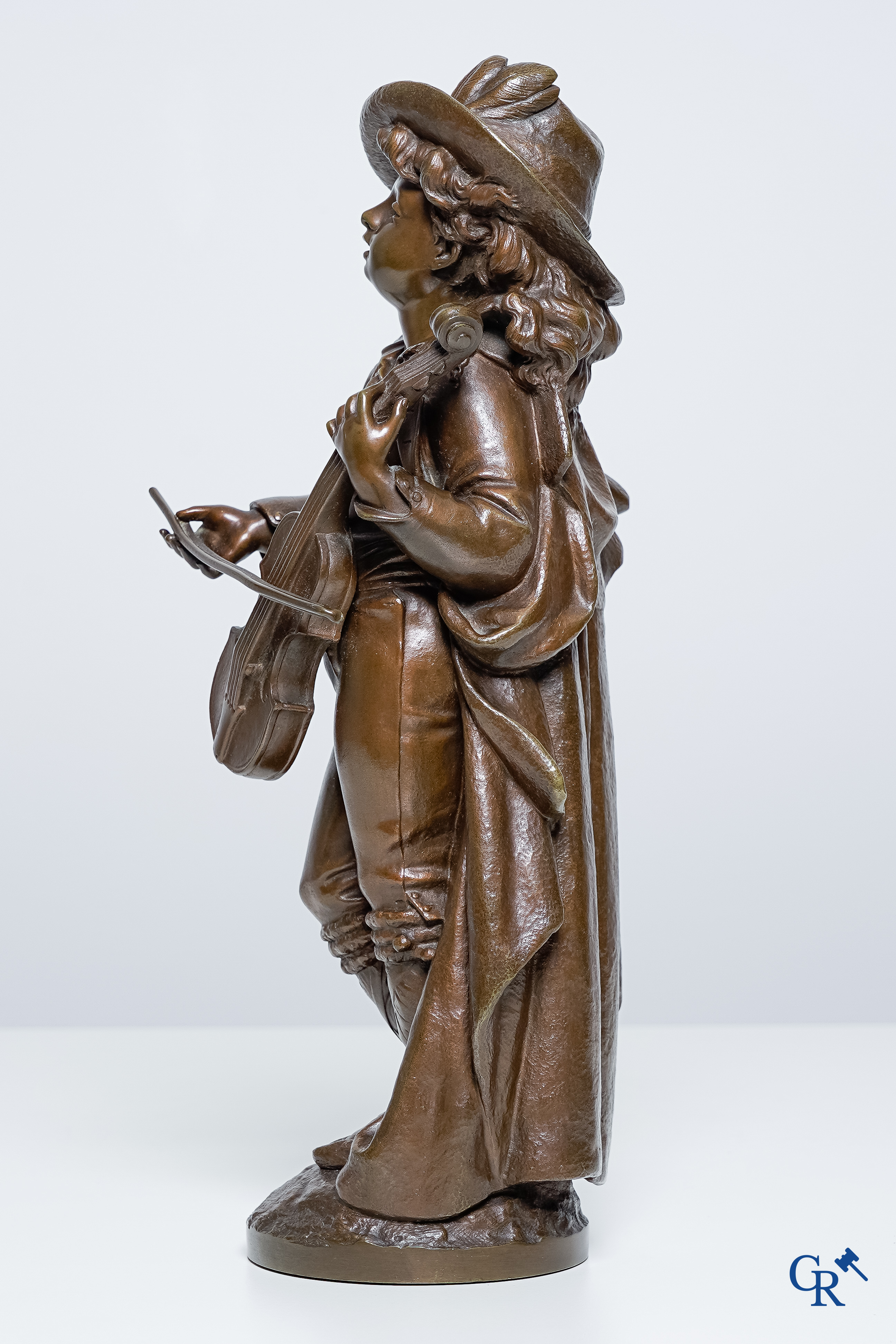 Adolphe Maubach. Bronze statue with brown patina. The young cellist. Signed A Maubach.