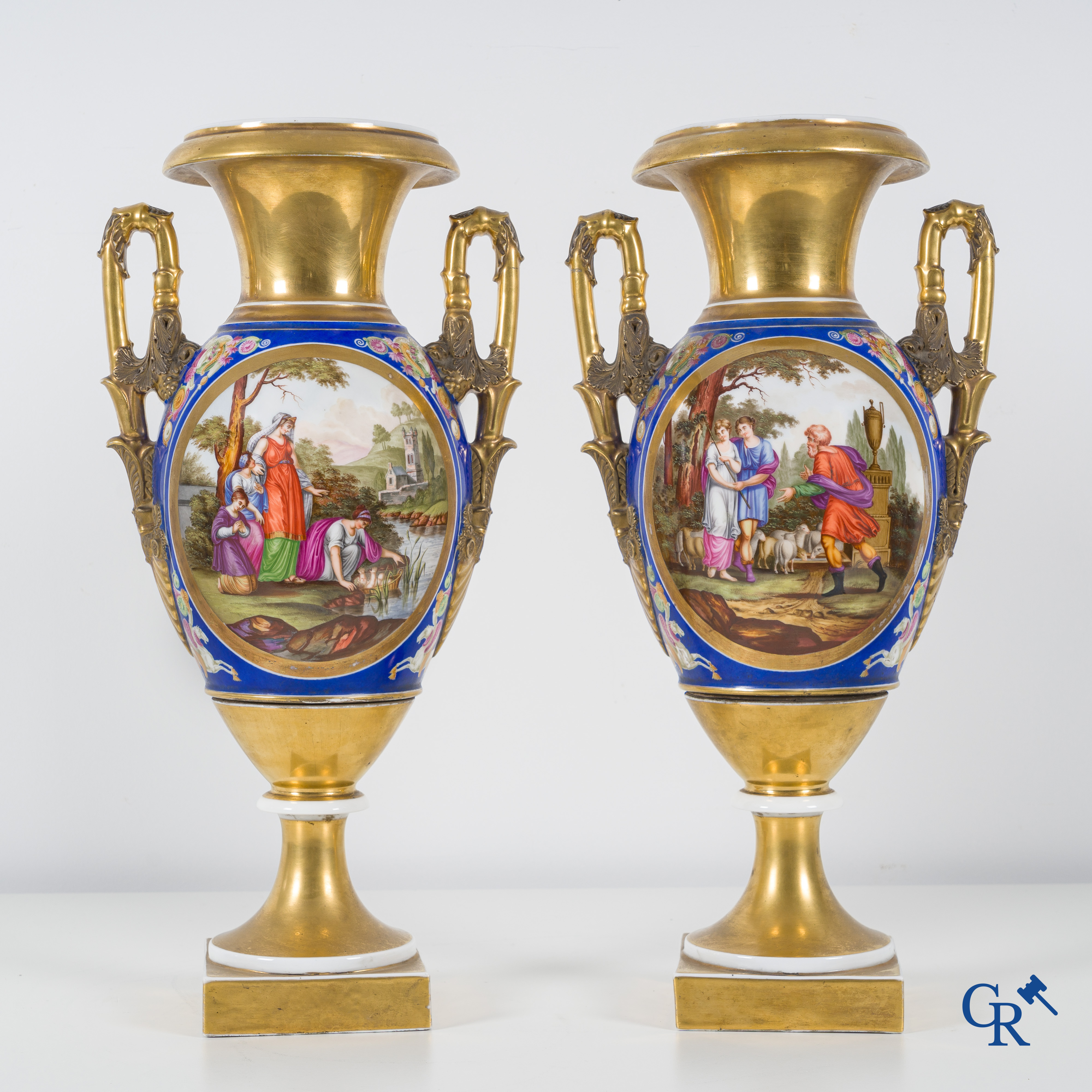 Empire, a pair of imposing multicolored decorated and gilded vases. Early 19th century.