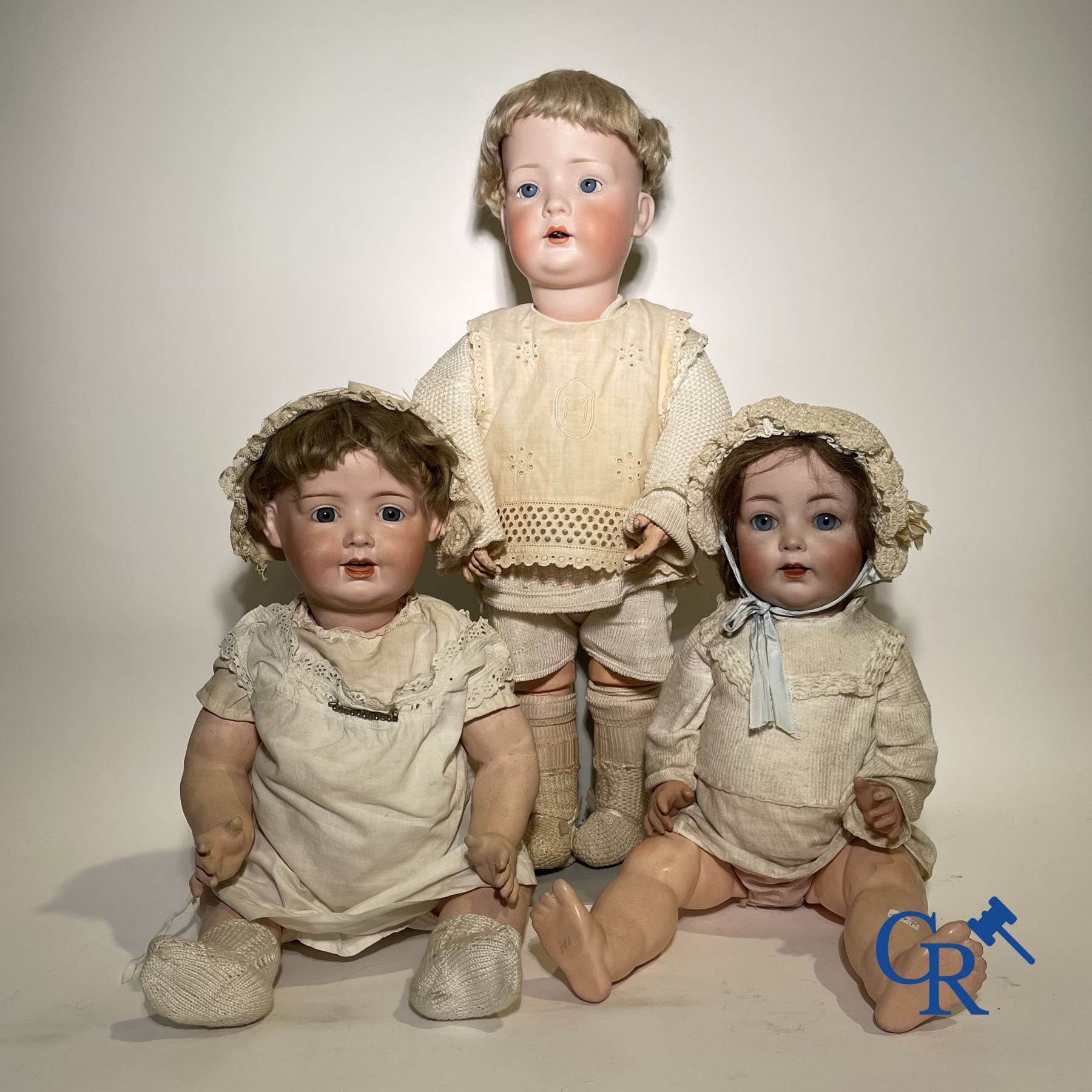 Toys: antique dolls: a lot of 3 antique dolls with porcelain head.