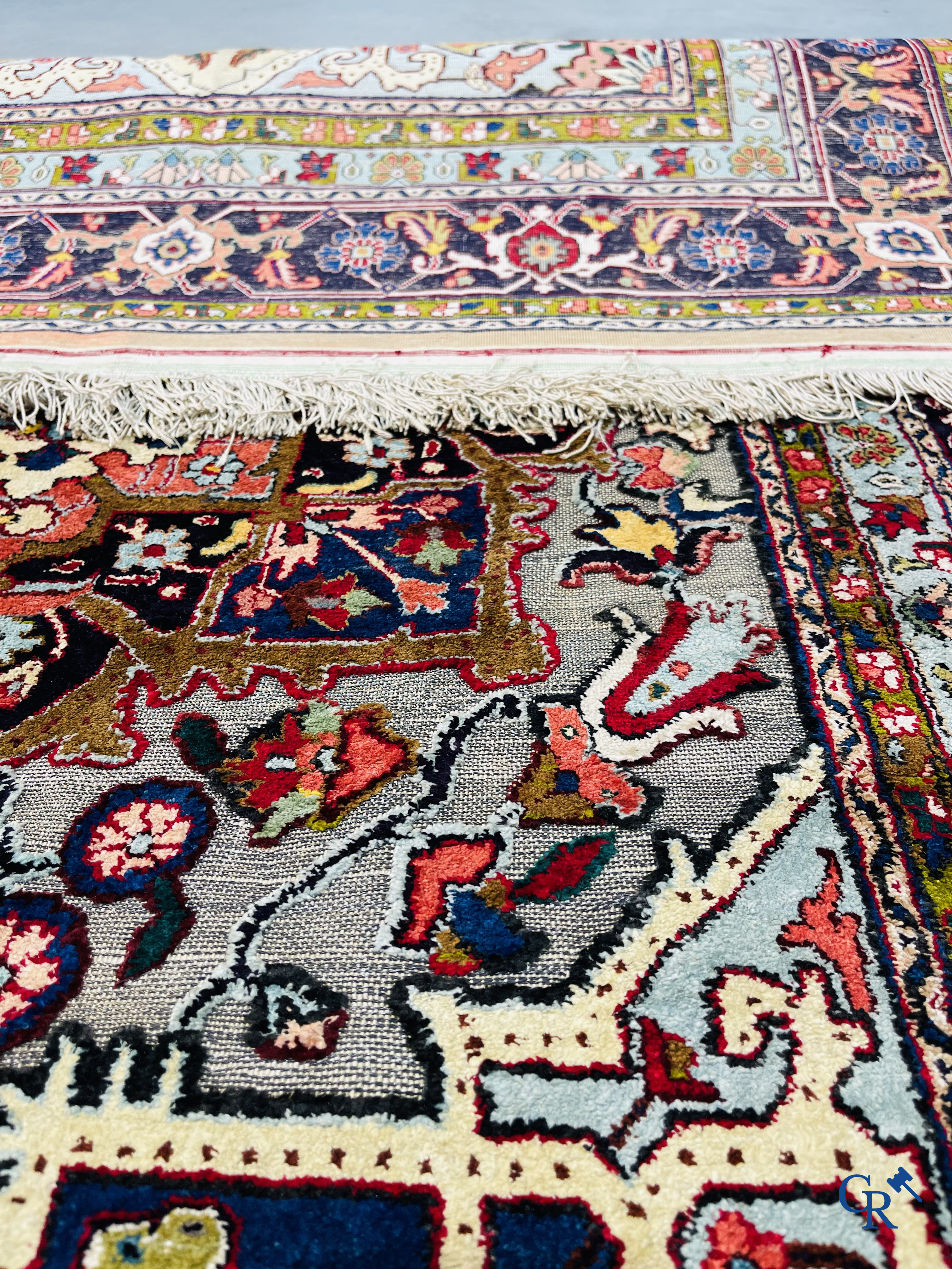 Oriental carpets: Heriz, an exceptionally finely knotted carpet decorated with silver thread.