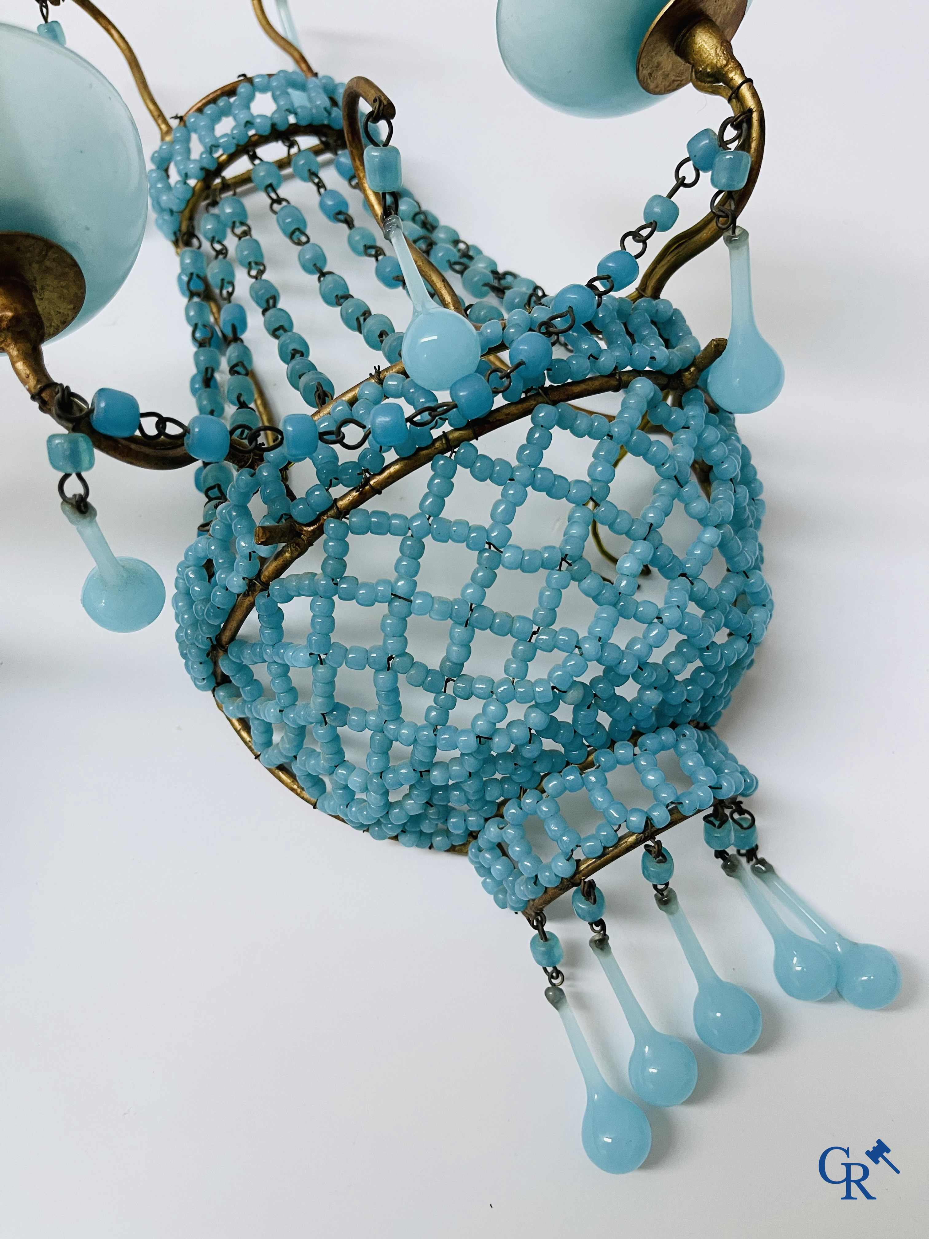 Lighting, chandeliers. A nice paire of appliques in gilded brass and blue opaline.