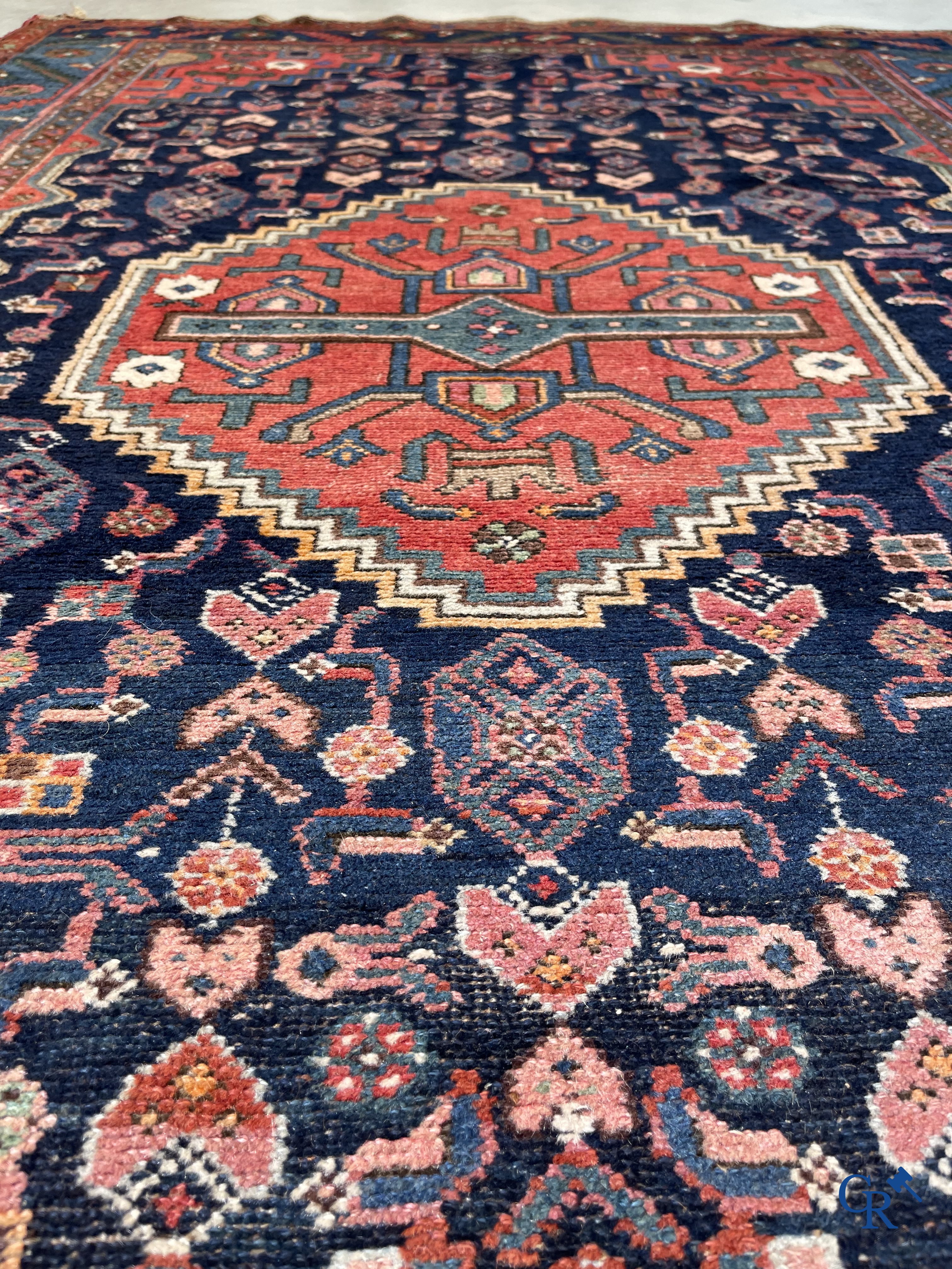 Oriental carpets, 2 antique hand-knotted Oriental carpets.