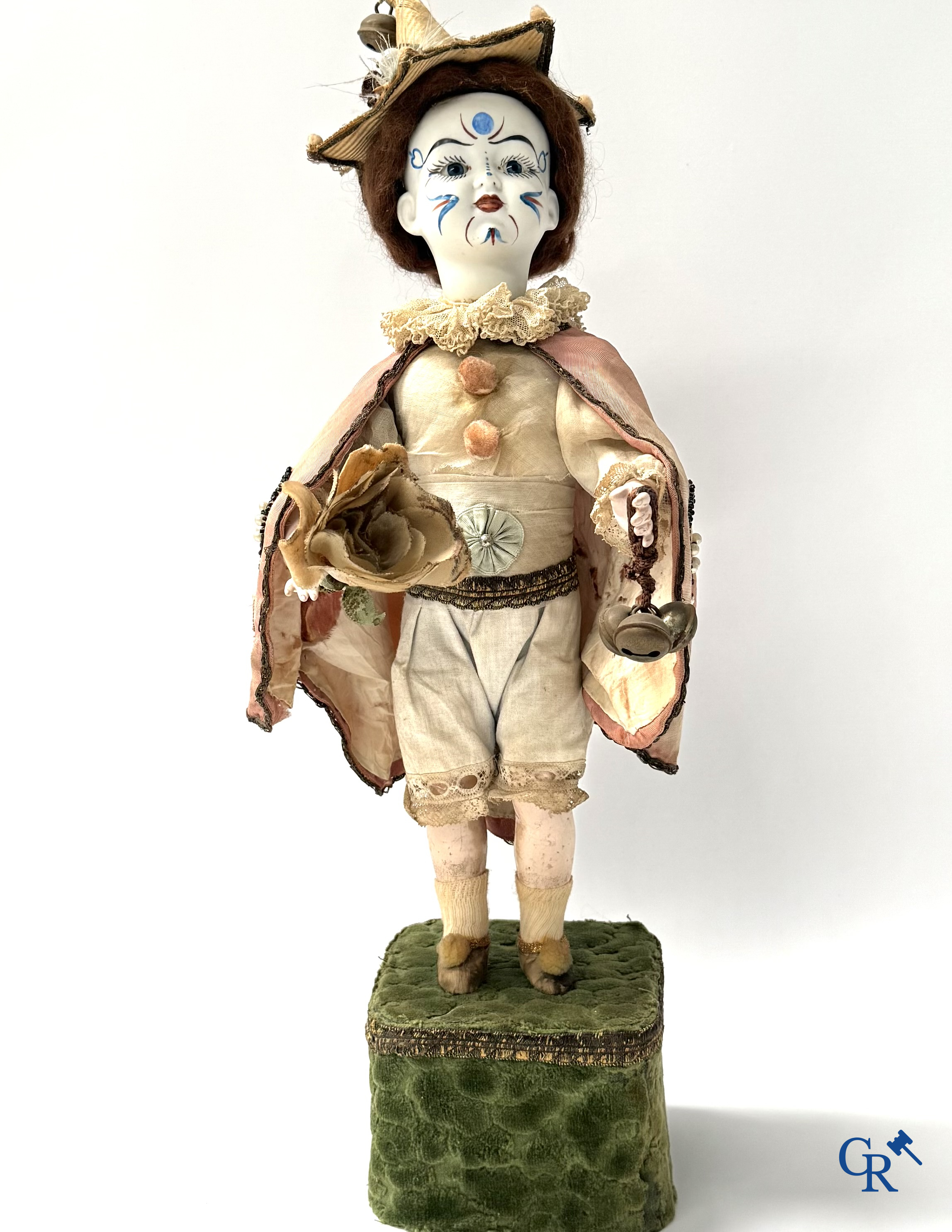 Lambert, Automaat. Clown met bewegingsmechanisme, muziek en porselein hoofd. Circa 1900.