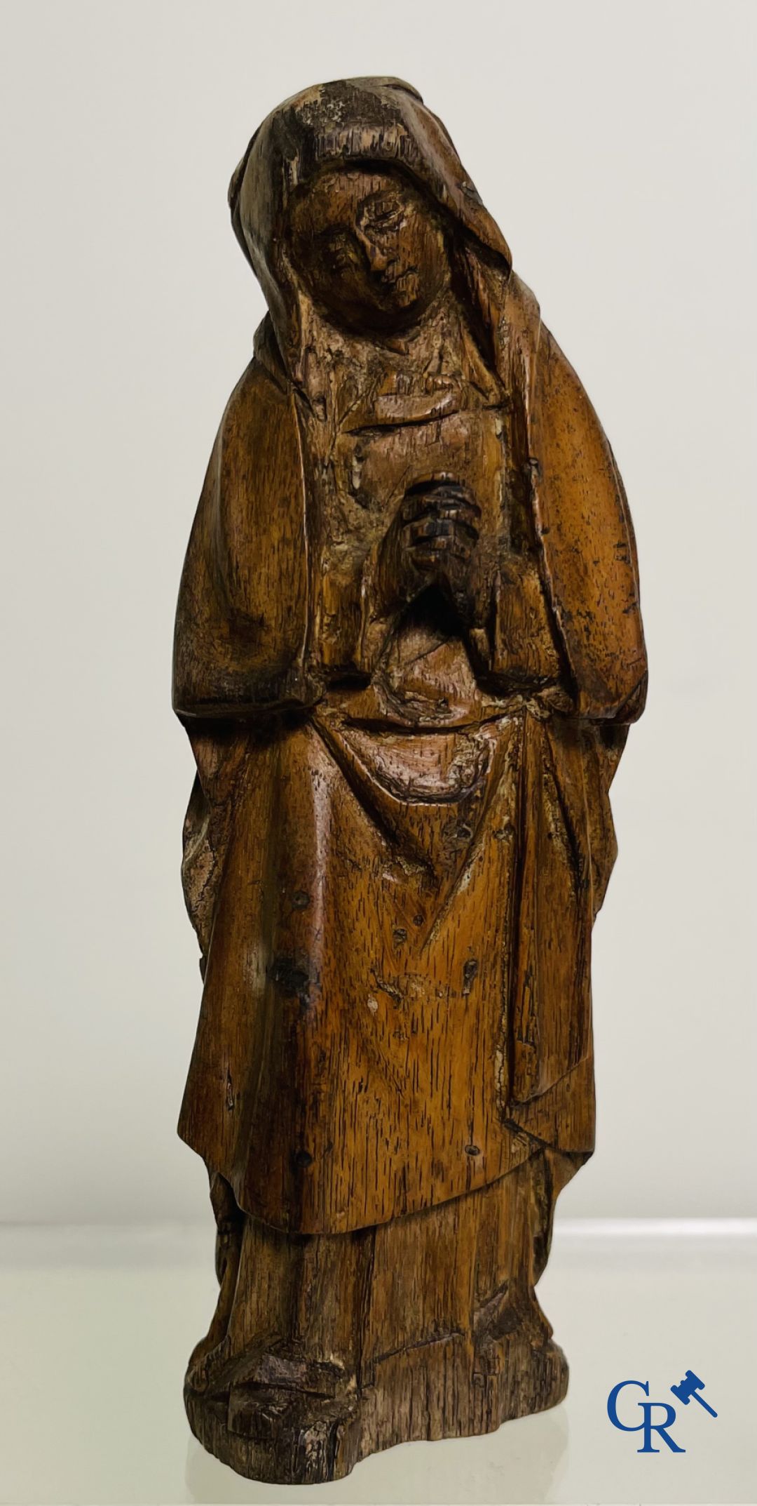 2 religious fragments in palm wood and lime wood. 16th-17th century.