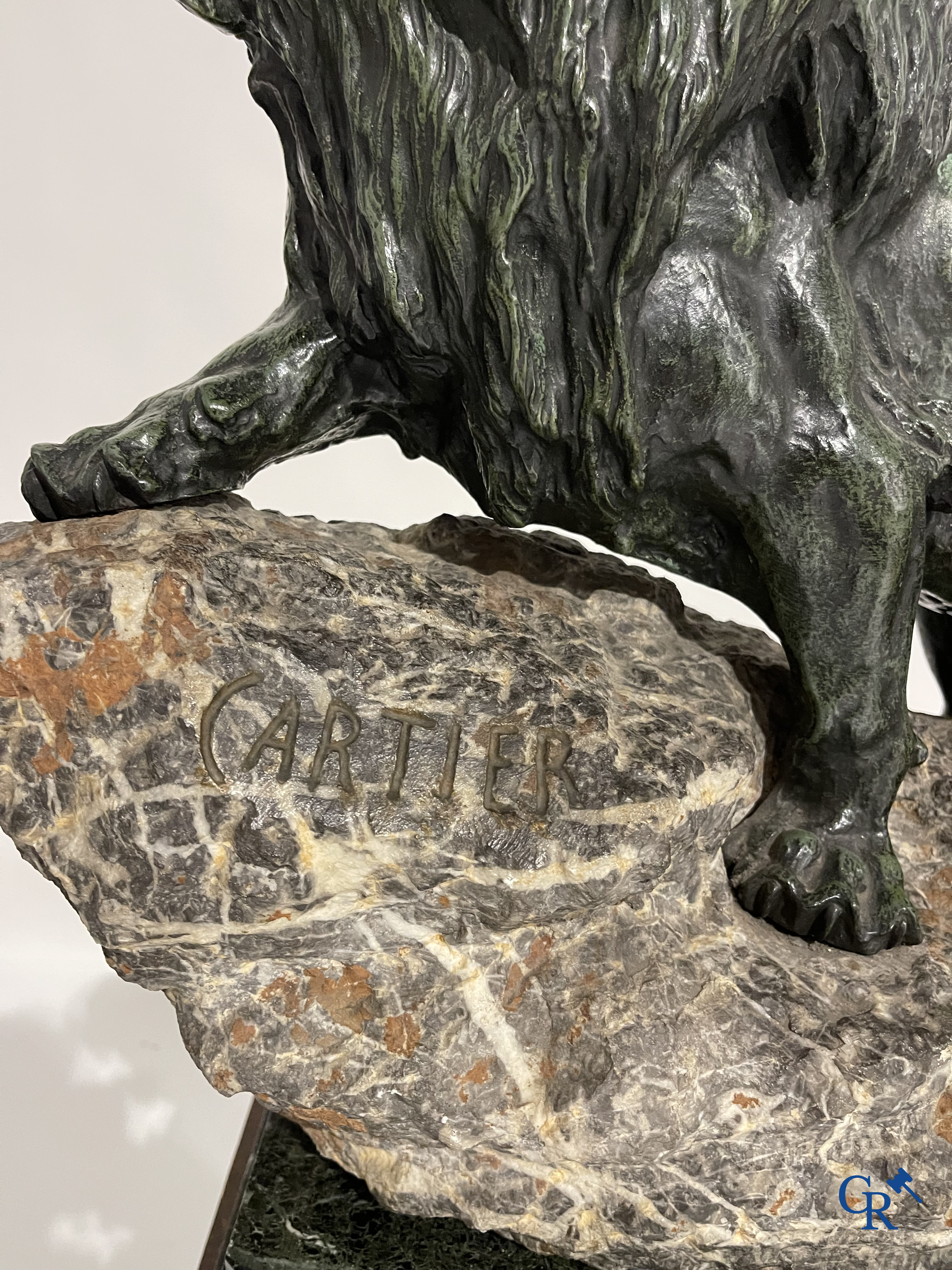 Thomas François Cartier (1879-1936) "Lion rugissant" Important groupe en bronze et pierre sur son socle en bois.