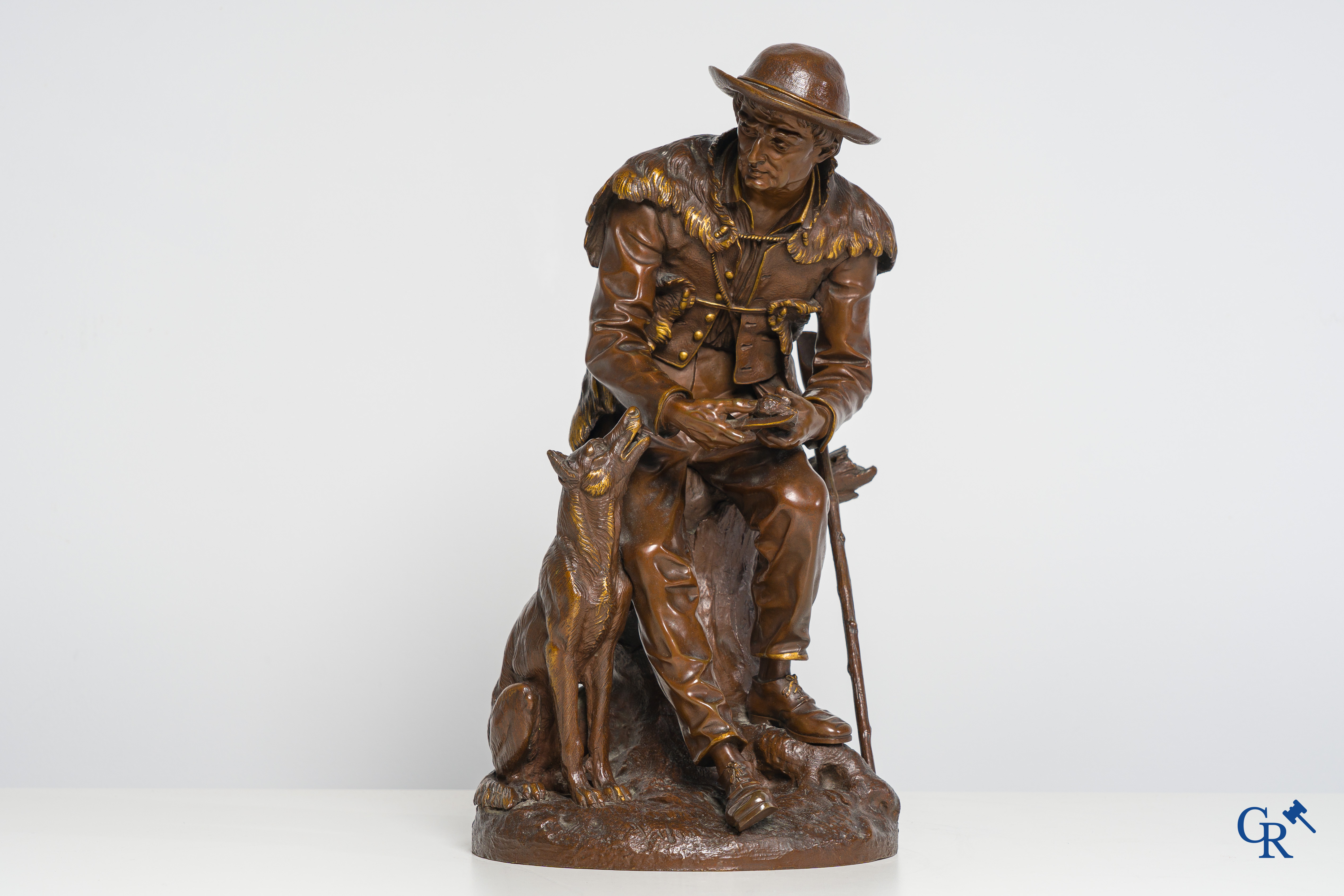 Anatole J. Guillot (1865-1911) Bronze statue with brown and gilded patina. Shepherd with dog.