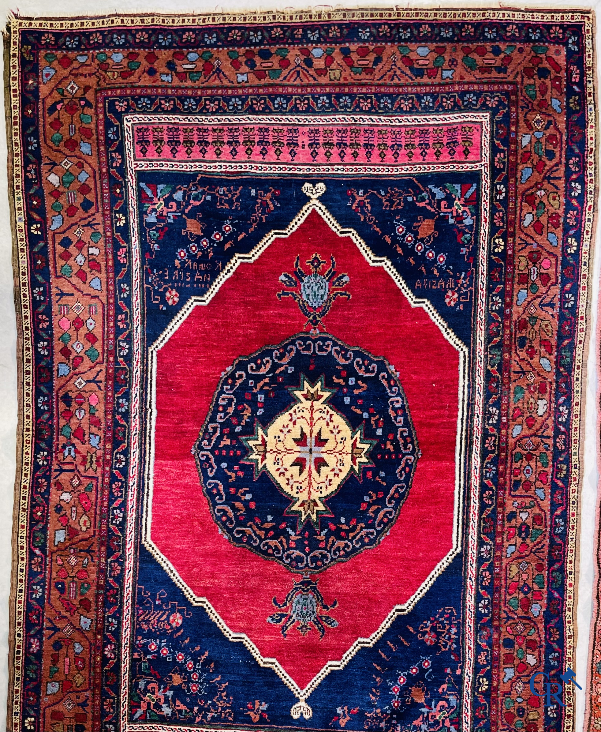 Oriental carpets, 2 antique hand-knotted Oriental carpets.