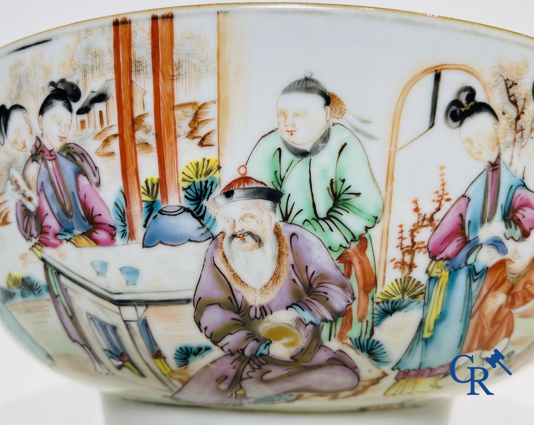 Un grand bol chinois decor mandarin en famille rose, une tasse et soucoupe en famille rose et une figurine en blanc de chine.