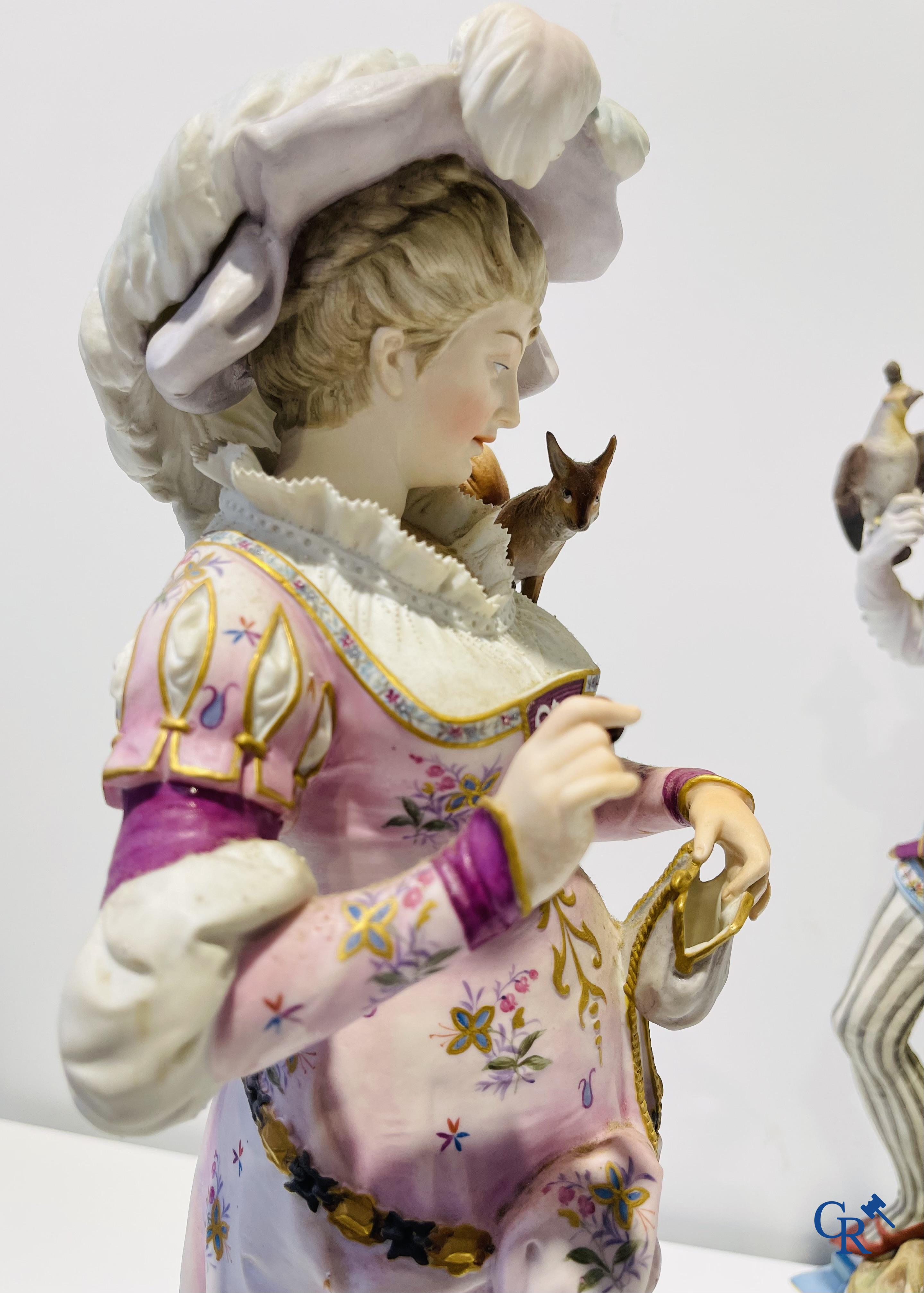 Exceptional pair of large statues in coloured and gilded biscuit porcelain. 2nd half of the 19th century.