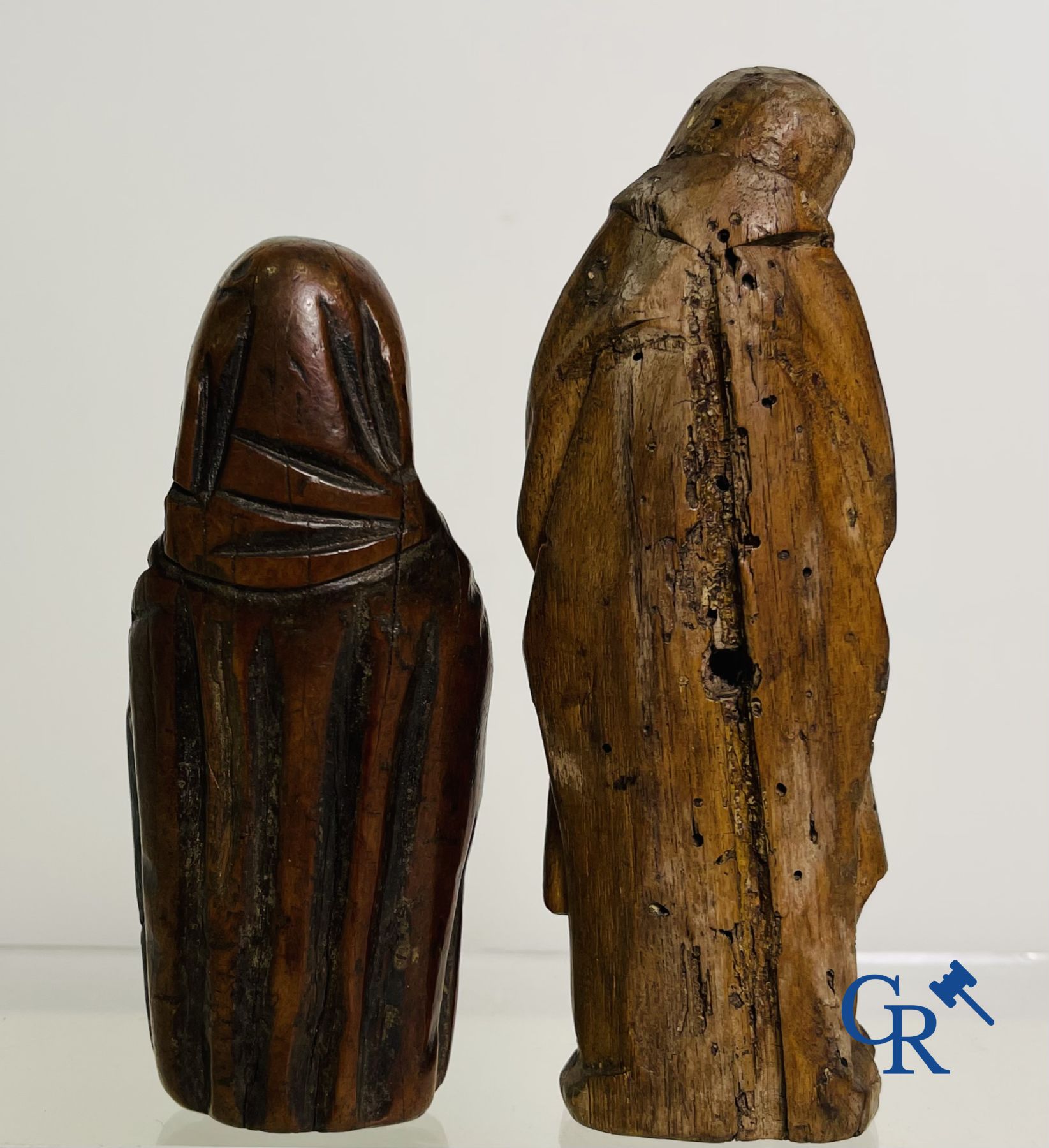 2 religious fragments in palm wood and lime wood. 16th-17th century.