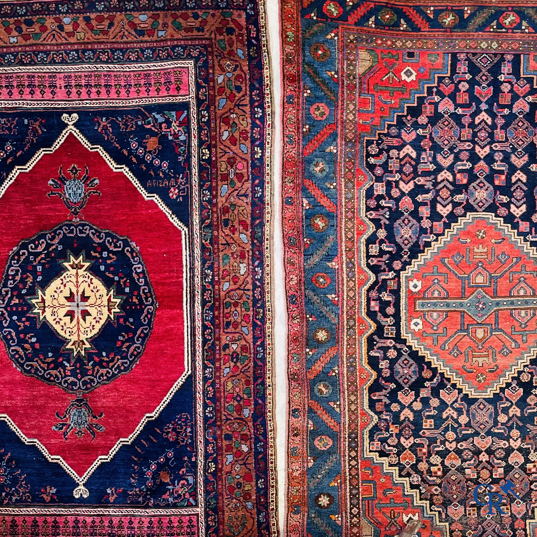 Oriental carpets, 2 antique hand-knotted Oriental carpets.