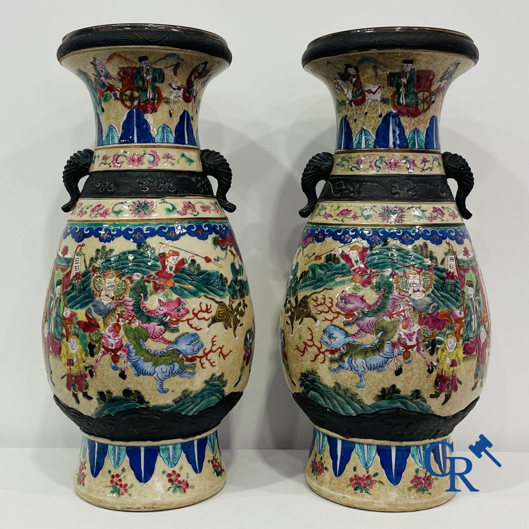 Asian Art: A pair of Chinese Nanking vases with famille rose decor.