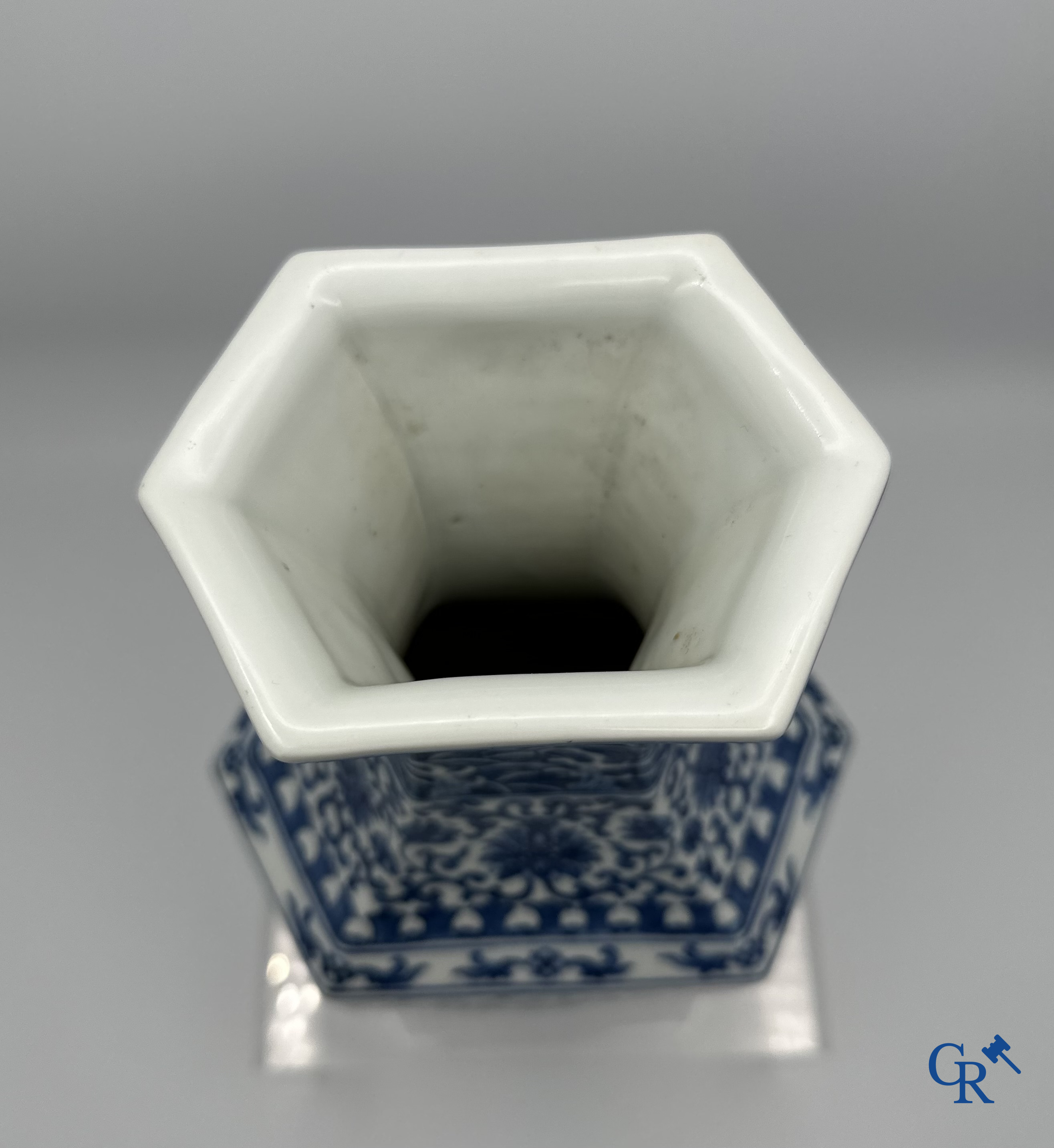 Chinese porcelain: Chinese blue and white vase with floral decor.