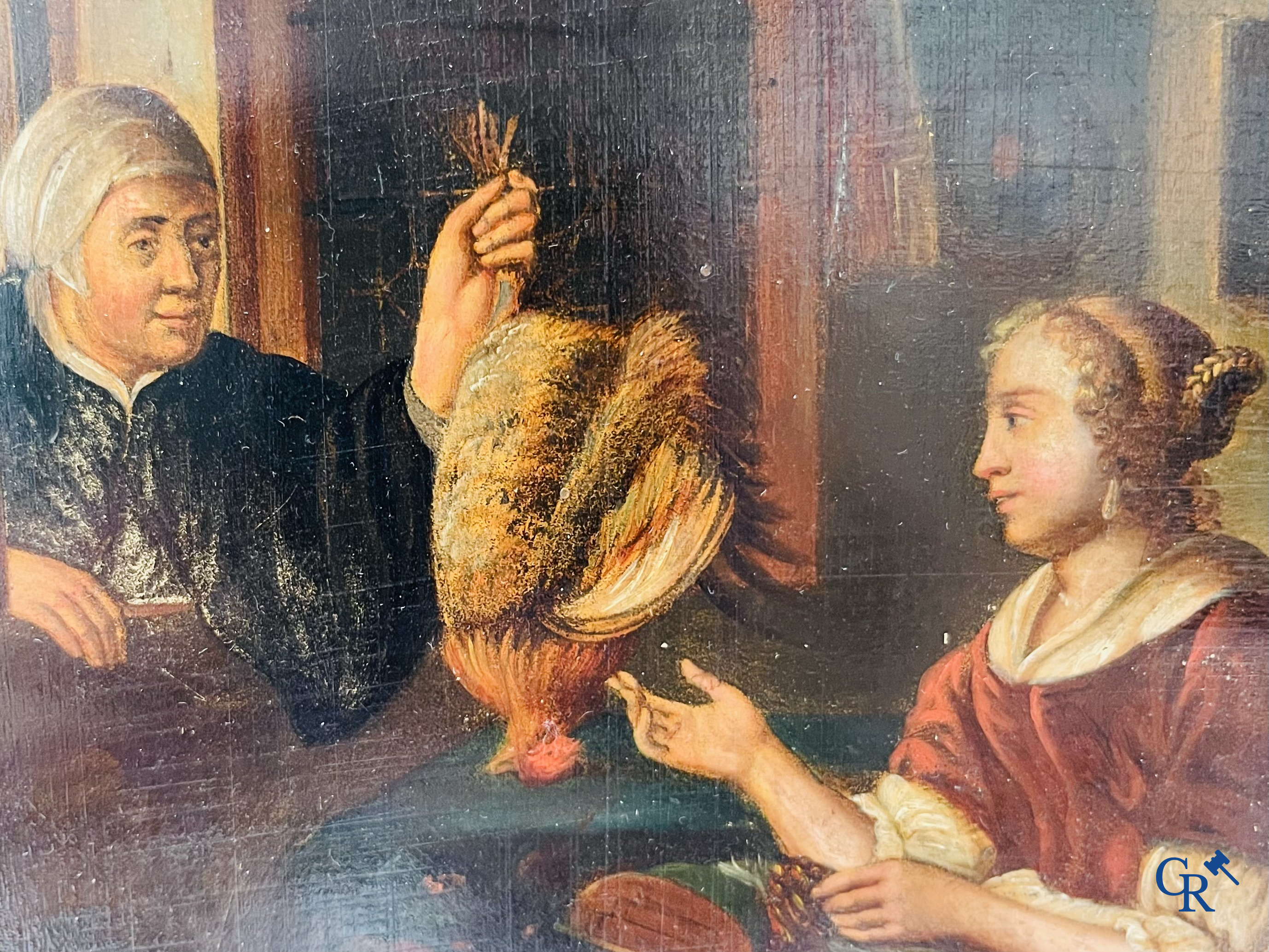 École flamande, scène d'intérieur avec un éleveur de poulet, huile sur métal.