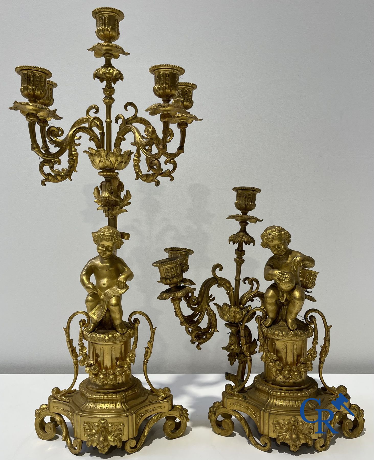 3-piece gilded bronze chimney set in LVI-style with putti. Jules Petit à Paris. Napoleon III period.