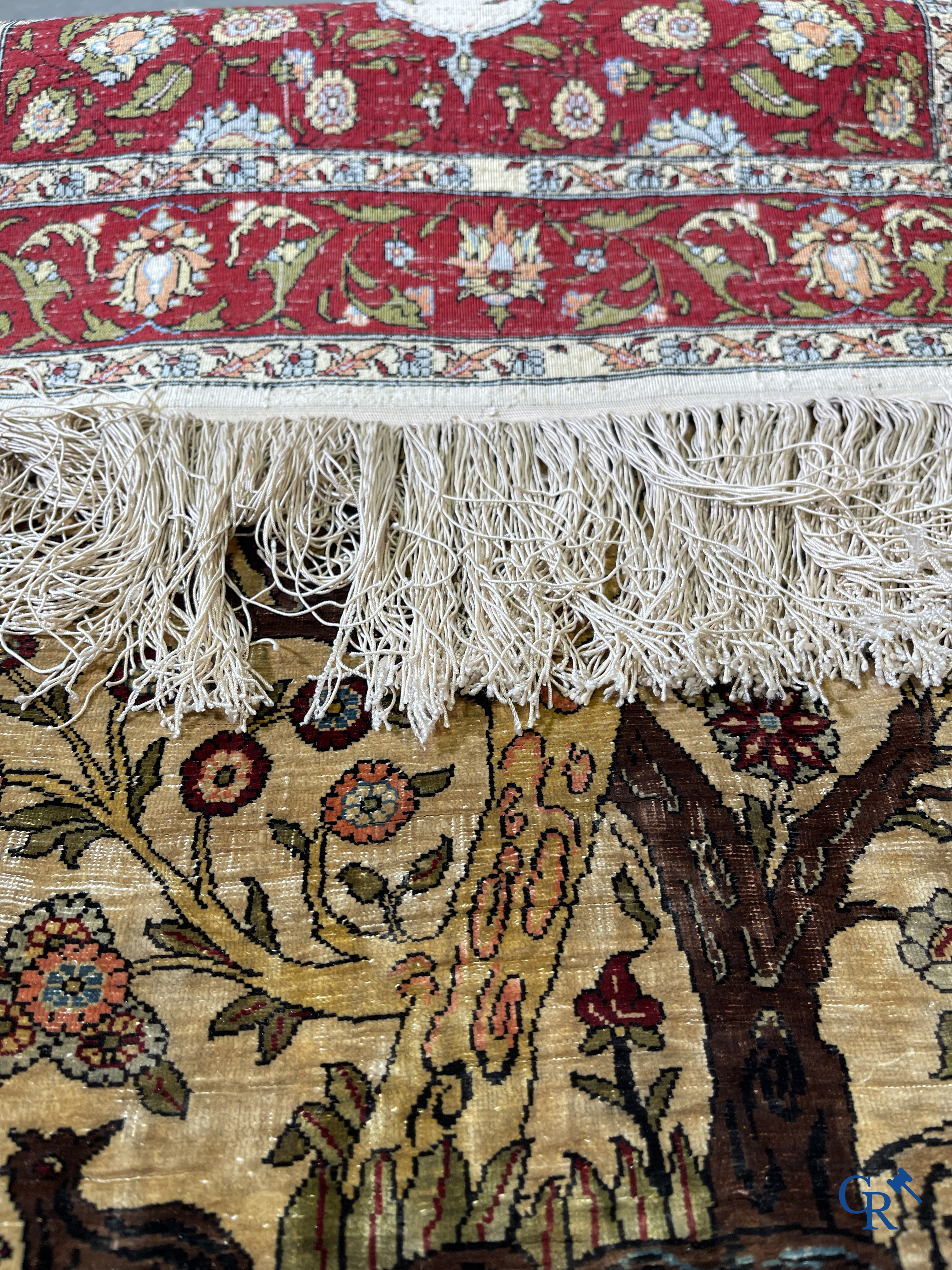 Oriental carpets, Hereke, a finely hand-knotted and signed silk carpet with a tree of life.