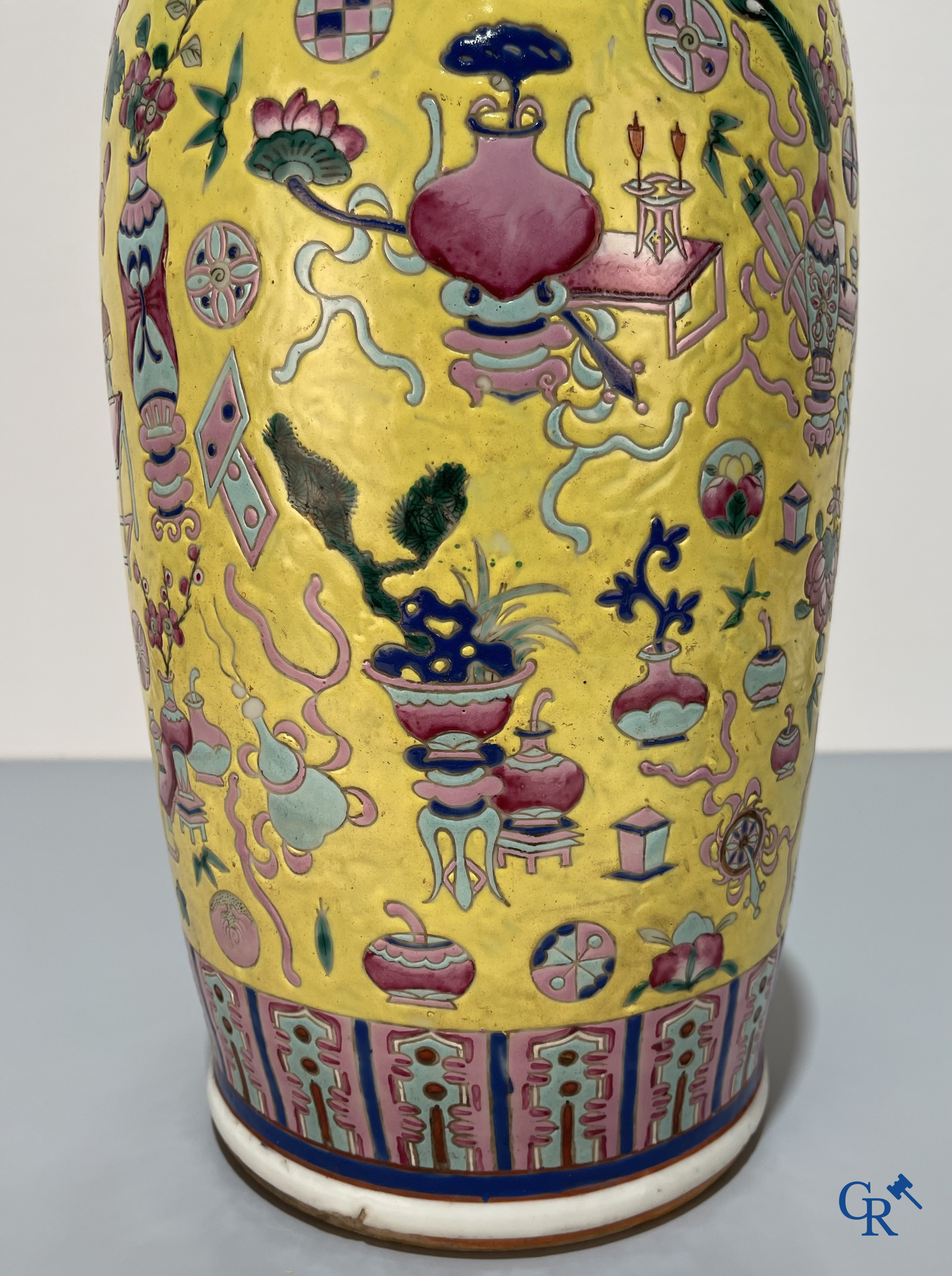 Asian Art, Chinese porcelain, a large Chinese famille jaune and rose vase with a decor of antiques. 19th century.