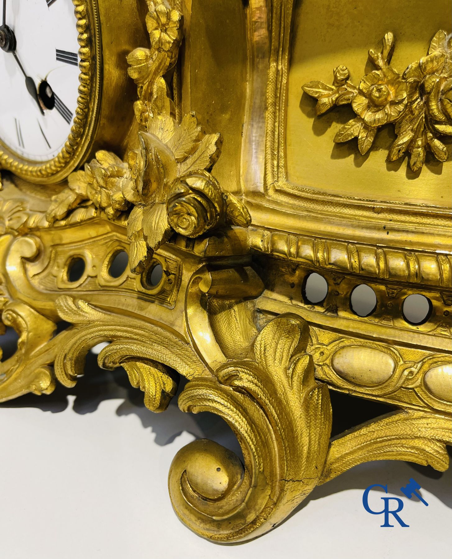 Bronze gilded clock with a romantic performance. 19th century.