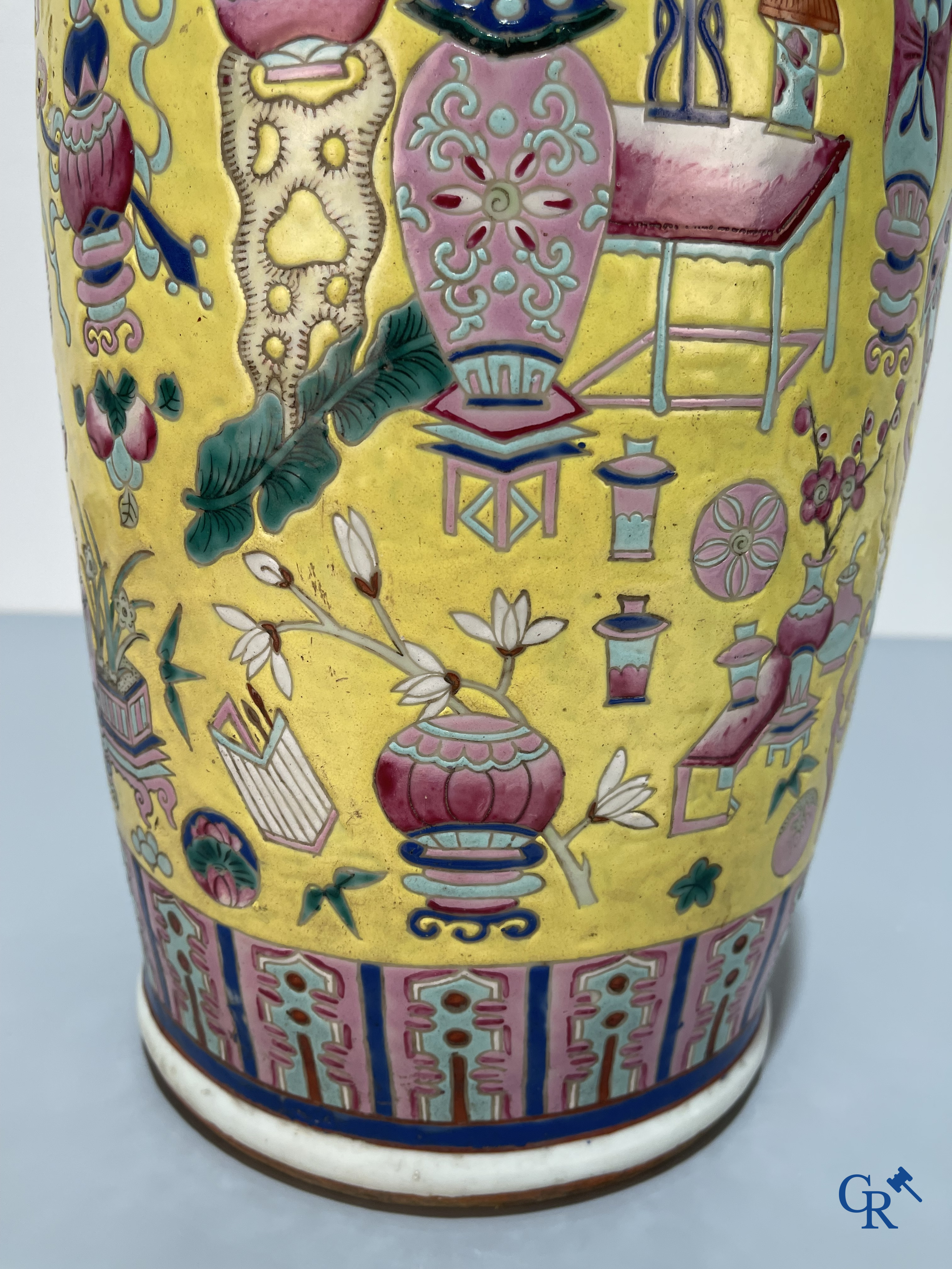 Asian Art, Chinese porcelain, a large Chinese famille jaune and rose vase with a decor of antiques. 19th century.