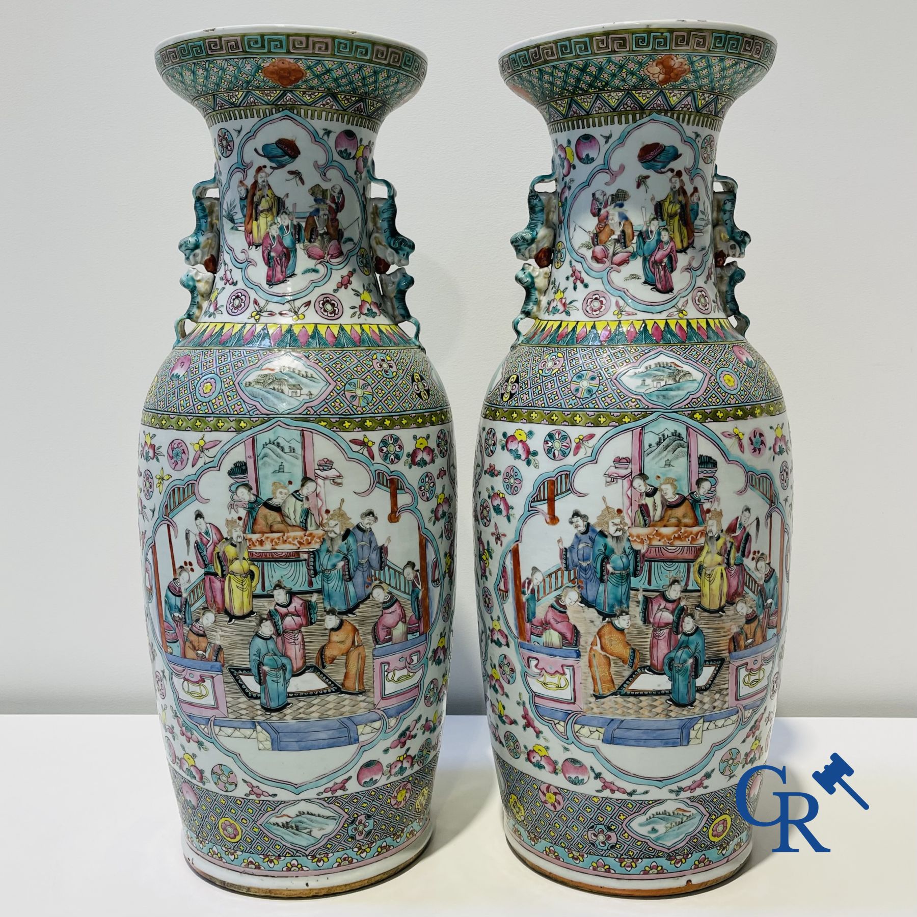 Asian art: Chinese porcelain, a pair of Chinese famille rose vases with court scenes. 19th century.