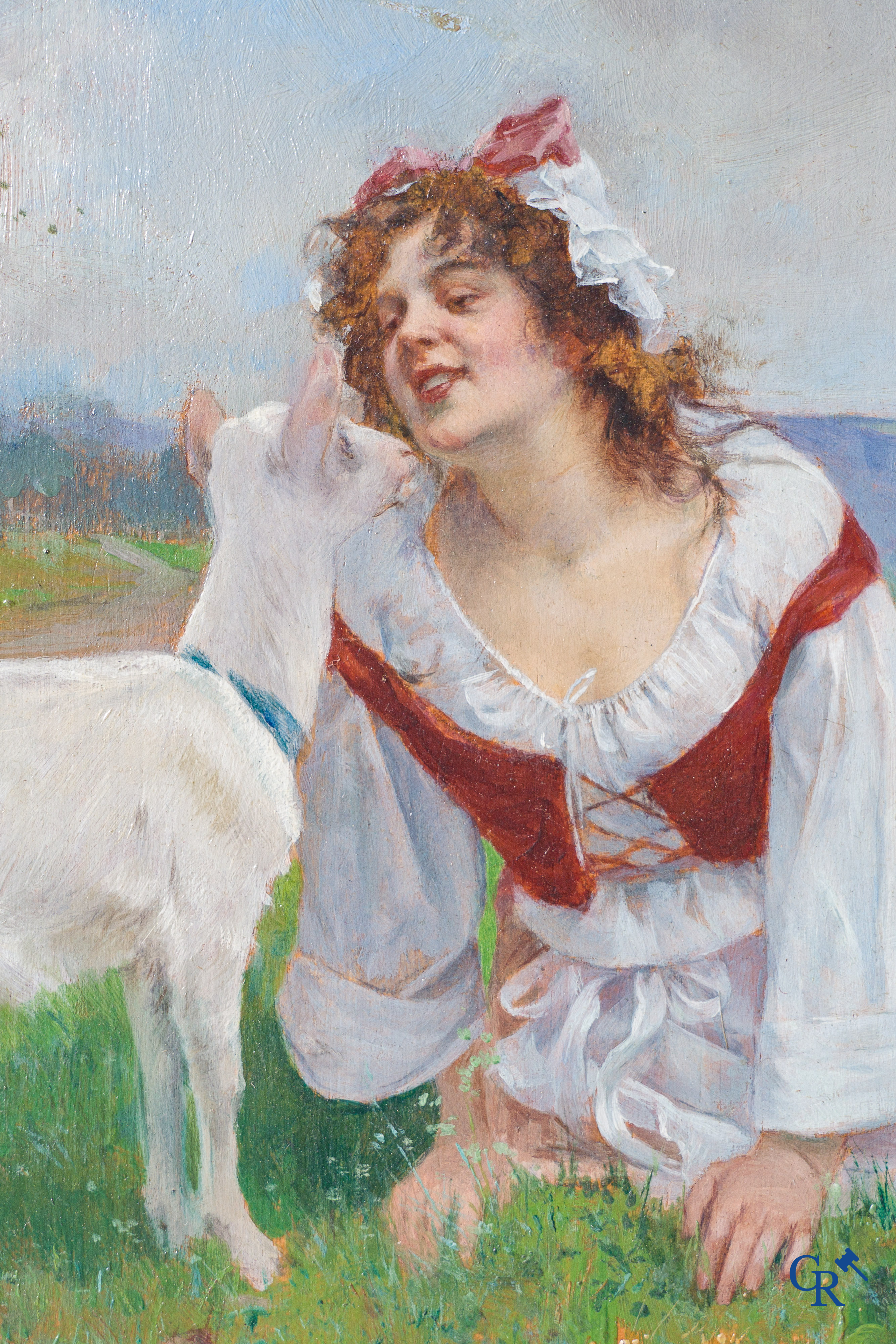 Albert Emile Artigue (1850-1927), romantisch schilderij van een vrouw met geitje in een mooi gedoreerde kader.