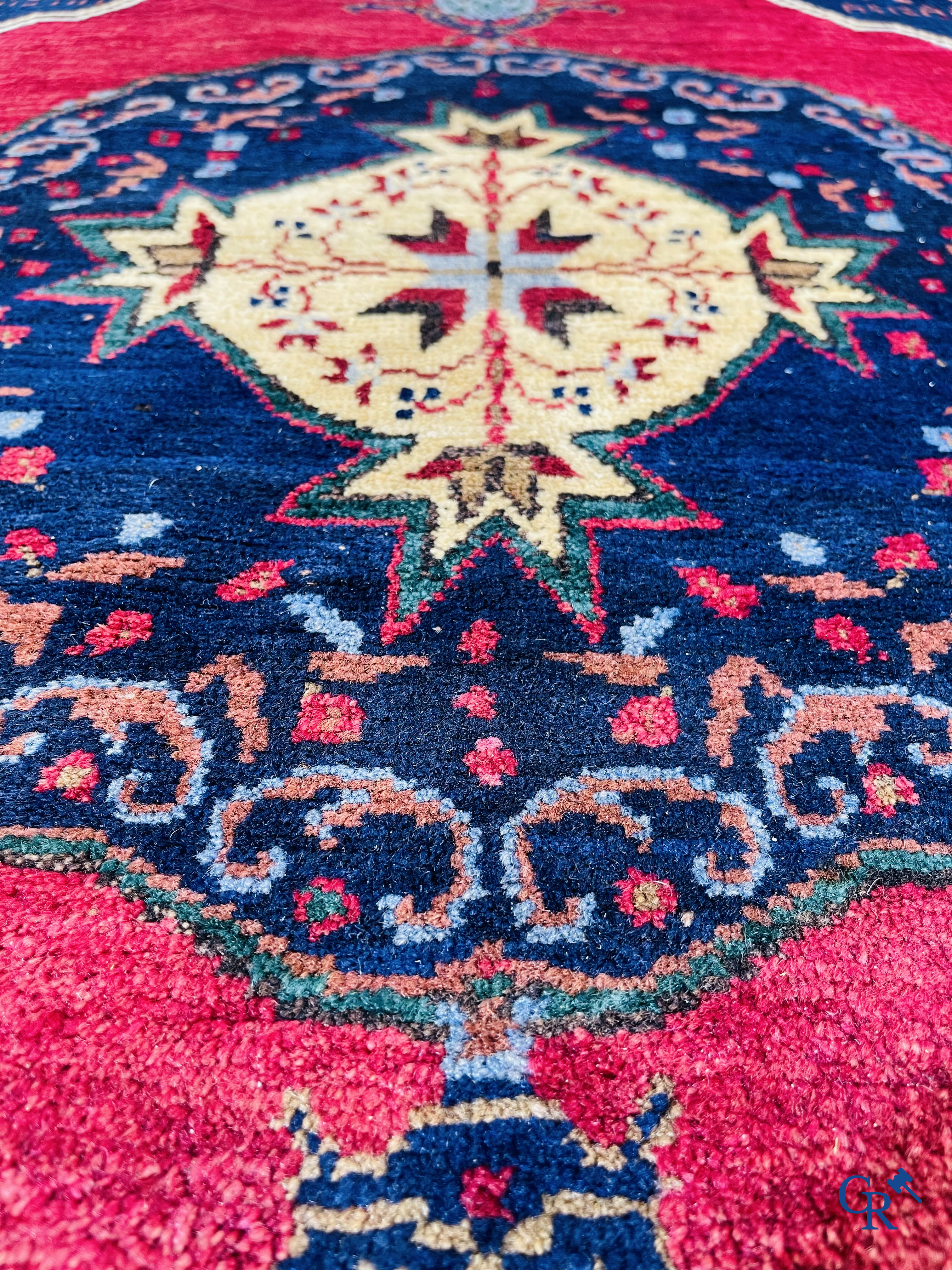 Oriental carpets, 2 antique hand-knotted Oriental carpets.