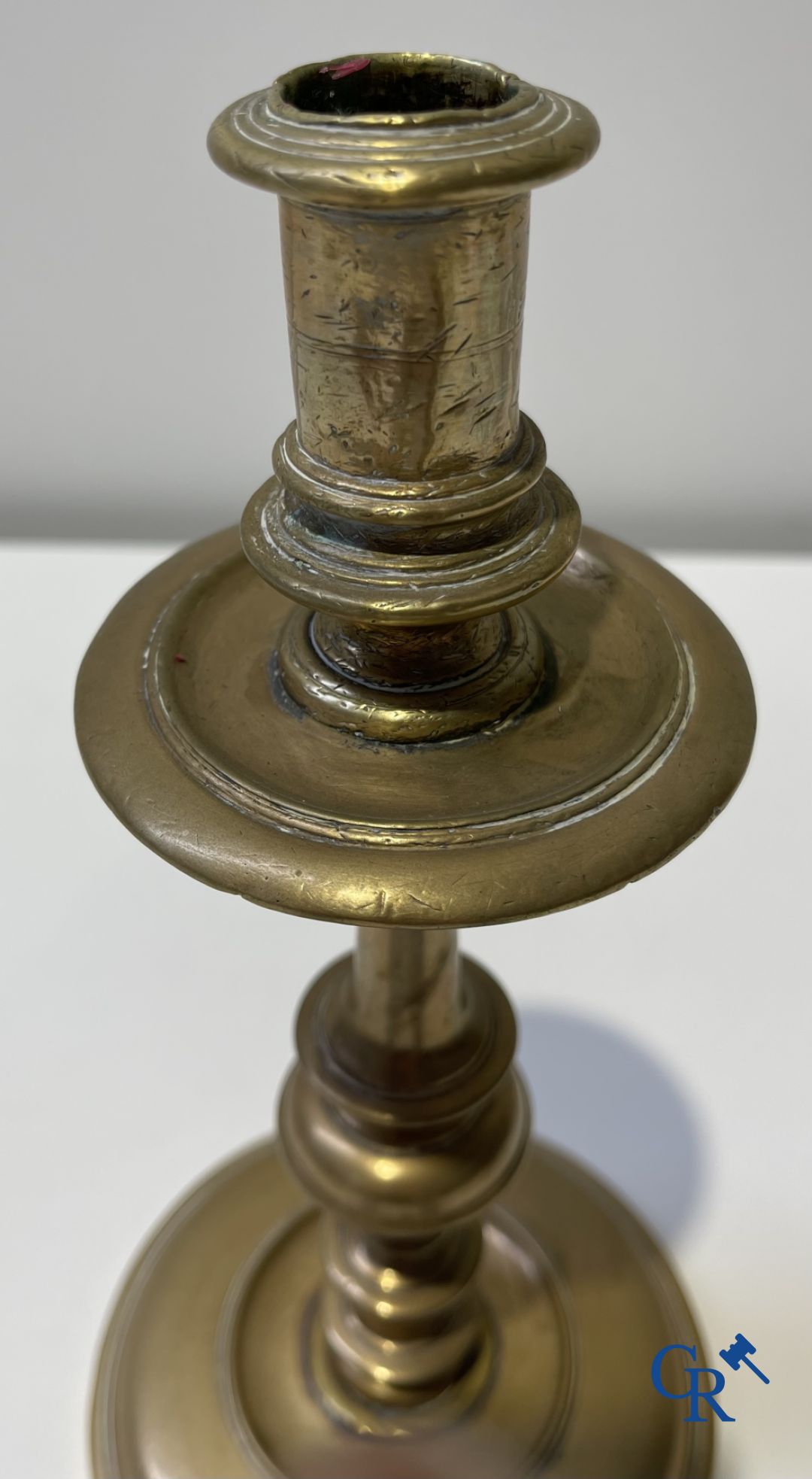 A lot of 2 large baptismal dishes, a portrait dish, 2 candlesticks and a holy water bucket. 16th-17th century.