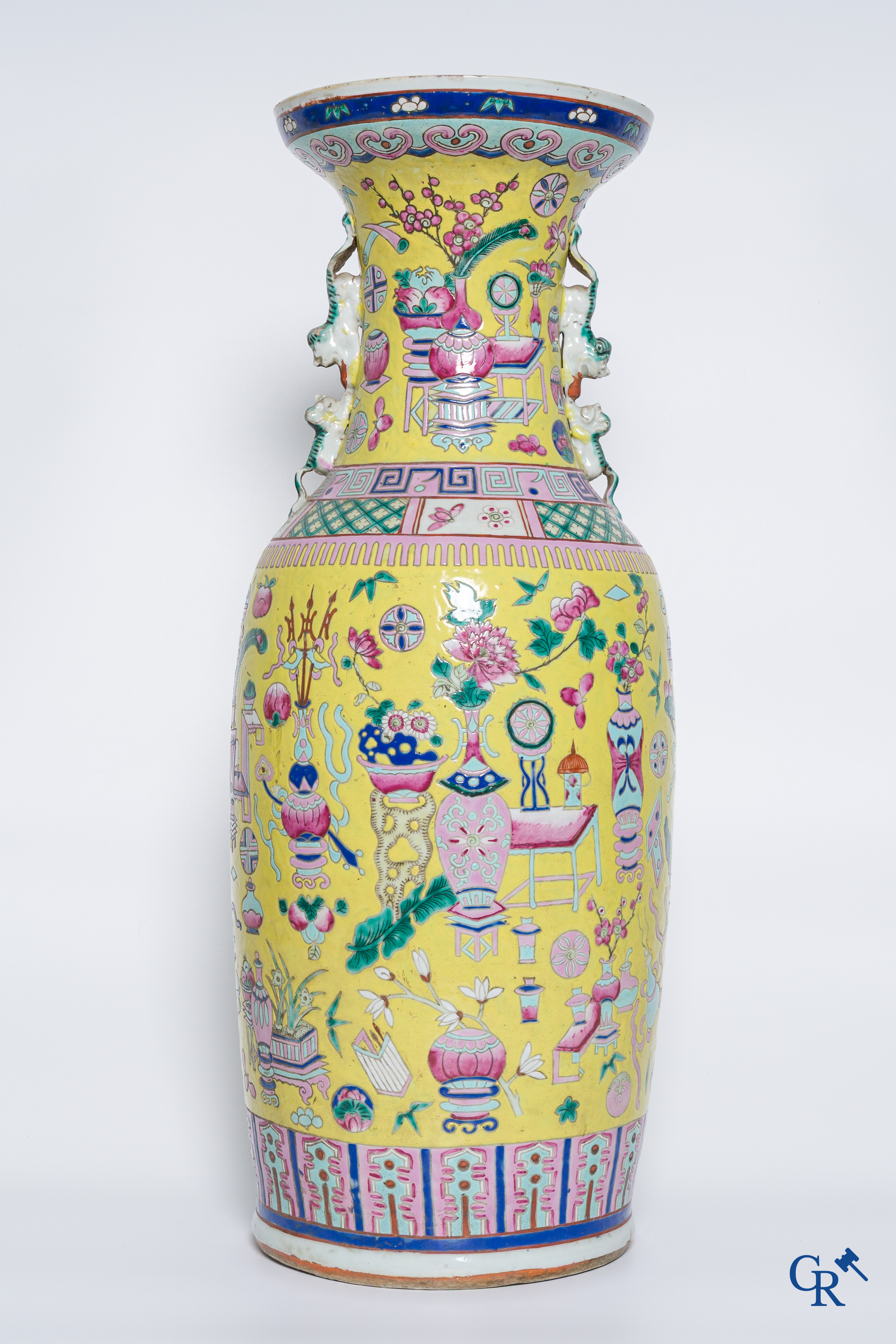 Asian Art, Chinese porcelain, a large Chinese famille jaune and rose vase with a decor of antiques. 19th century.