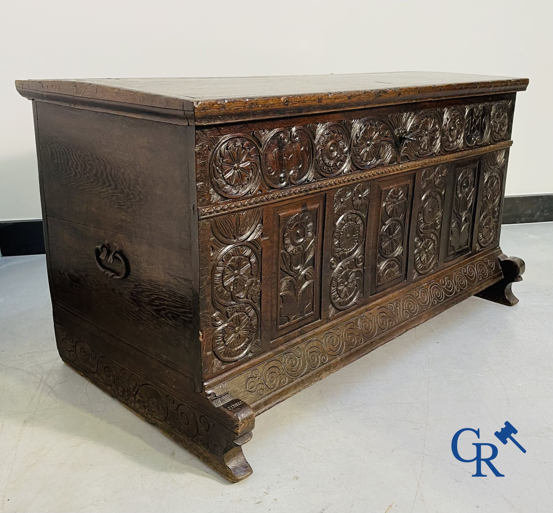 Furniture: Large sculpted oak chest. England, dated 1810.