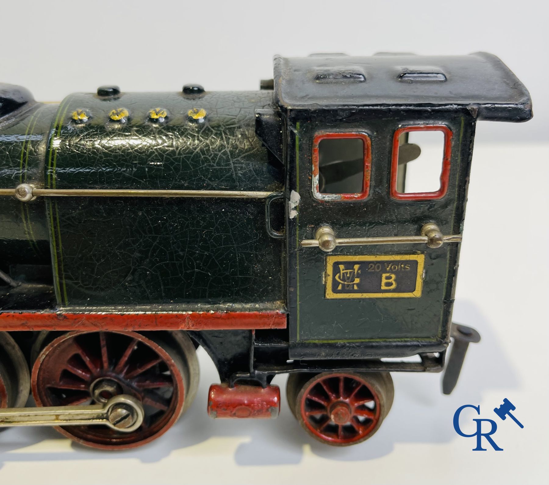 Jouets anciens: Märklin, Locomotive, tendre charbon à boggies et voiture restaurant.<br />
Vers 1930.