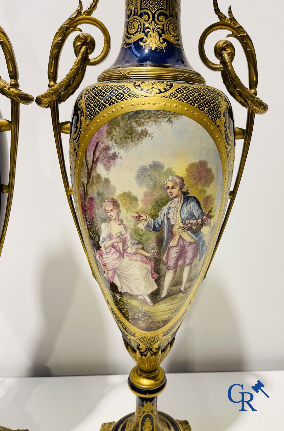 Sèvres: Poitevin. Pair of large vases in faience and bronze frames with romantic scenes. LXVI style. 19th-20th century.