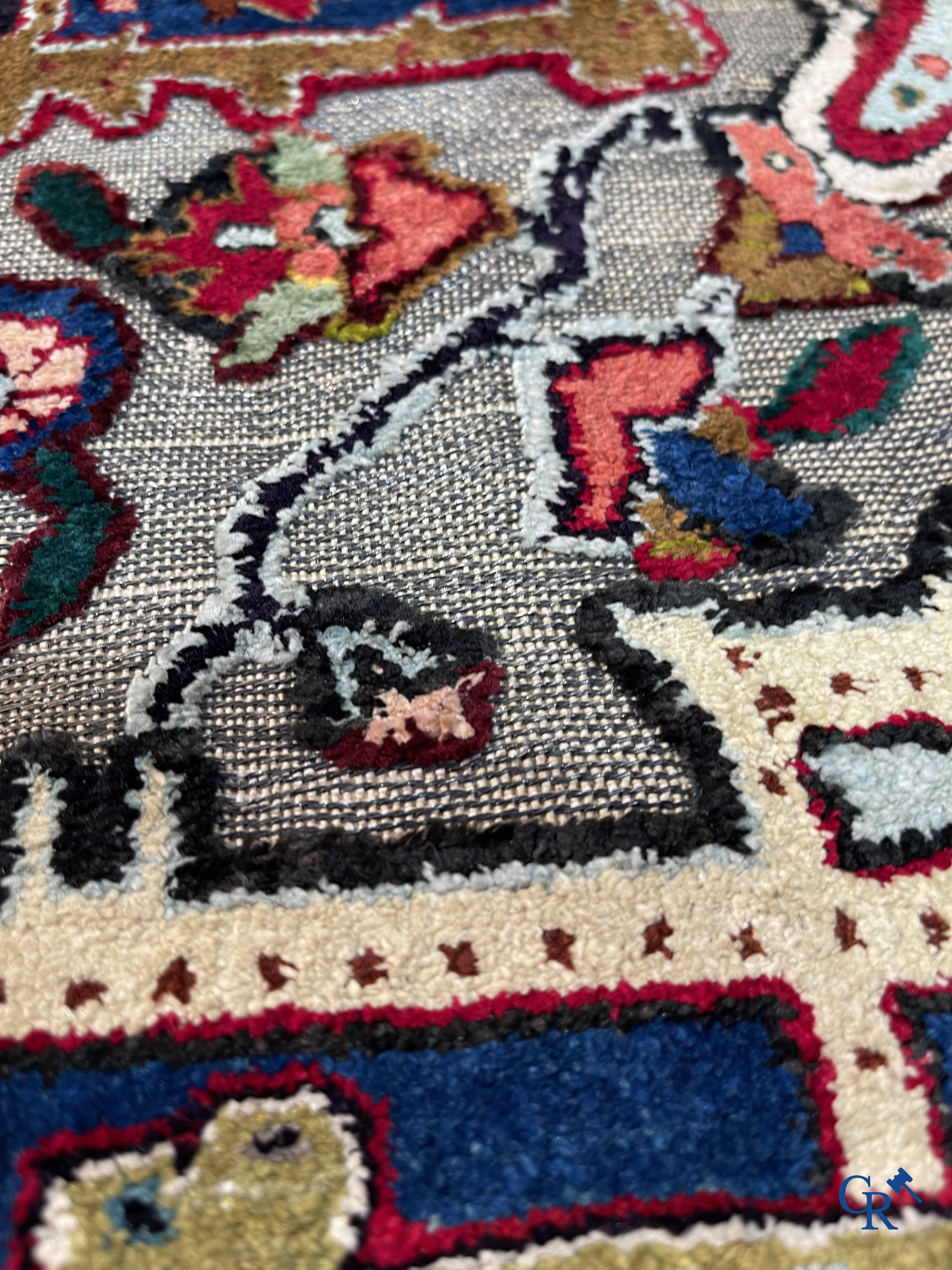 Oriental carpets: Heriz, an exceptionally finely knotted carpet decorated with silver thread.