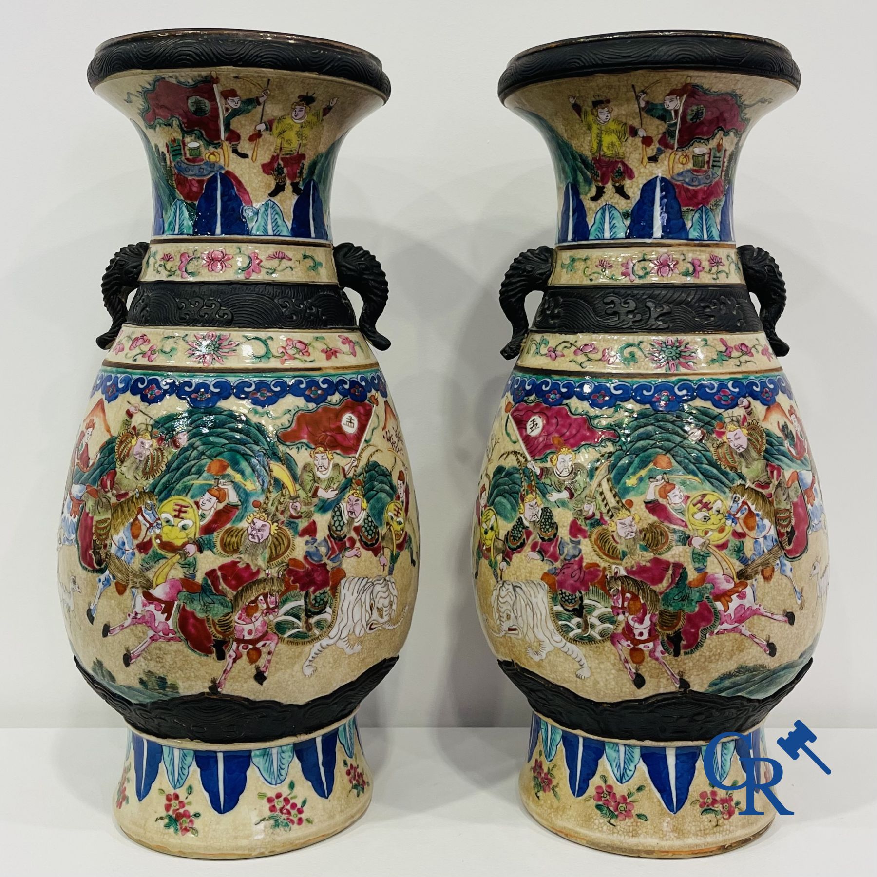 Asian Art: A pair of Chinese Nanking vases with famille rose decor.