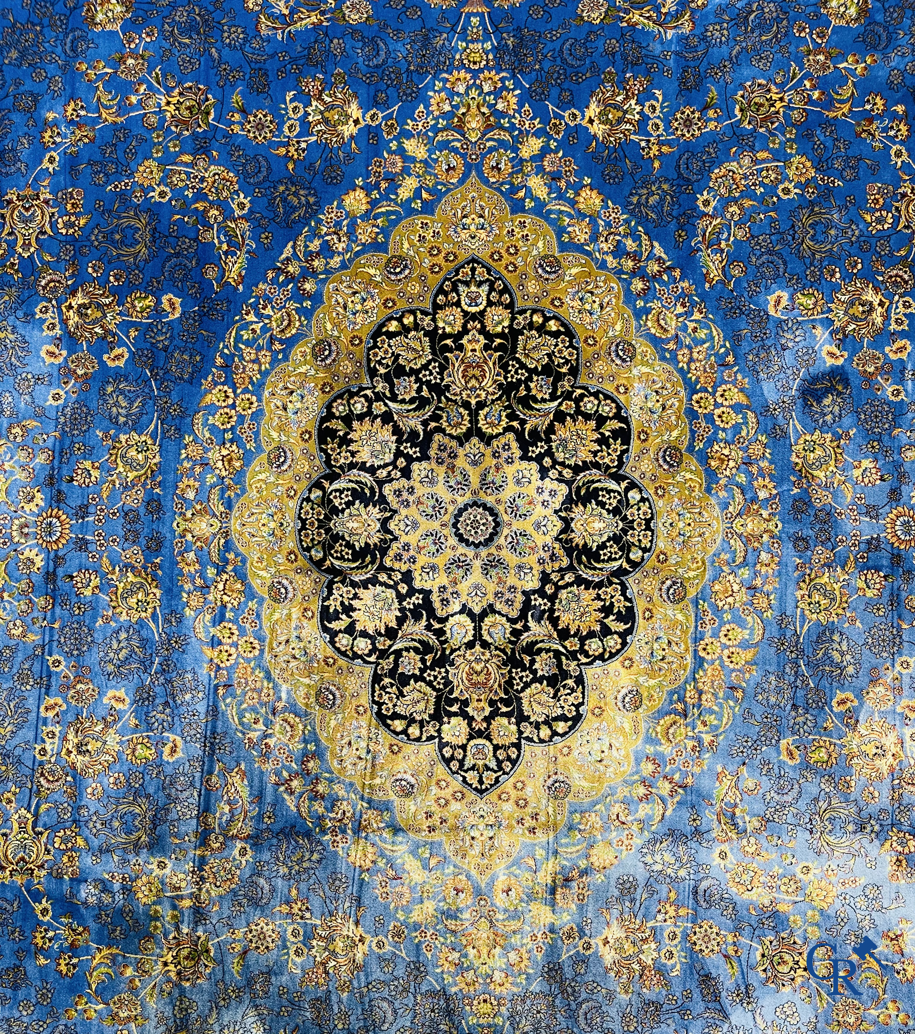 Carpets. Exceptional silk carpet with floral decor on a blue background.