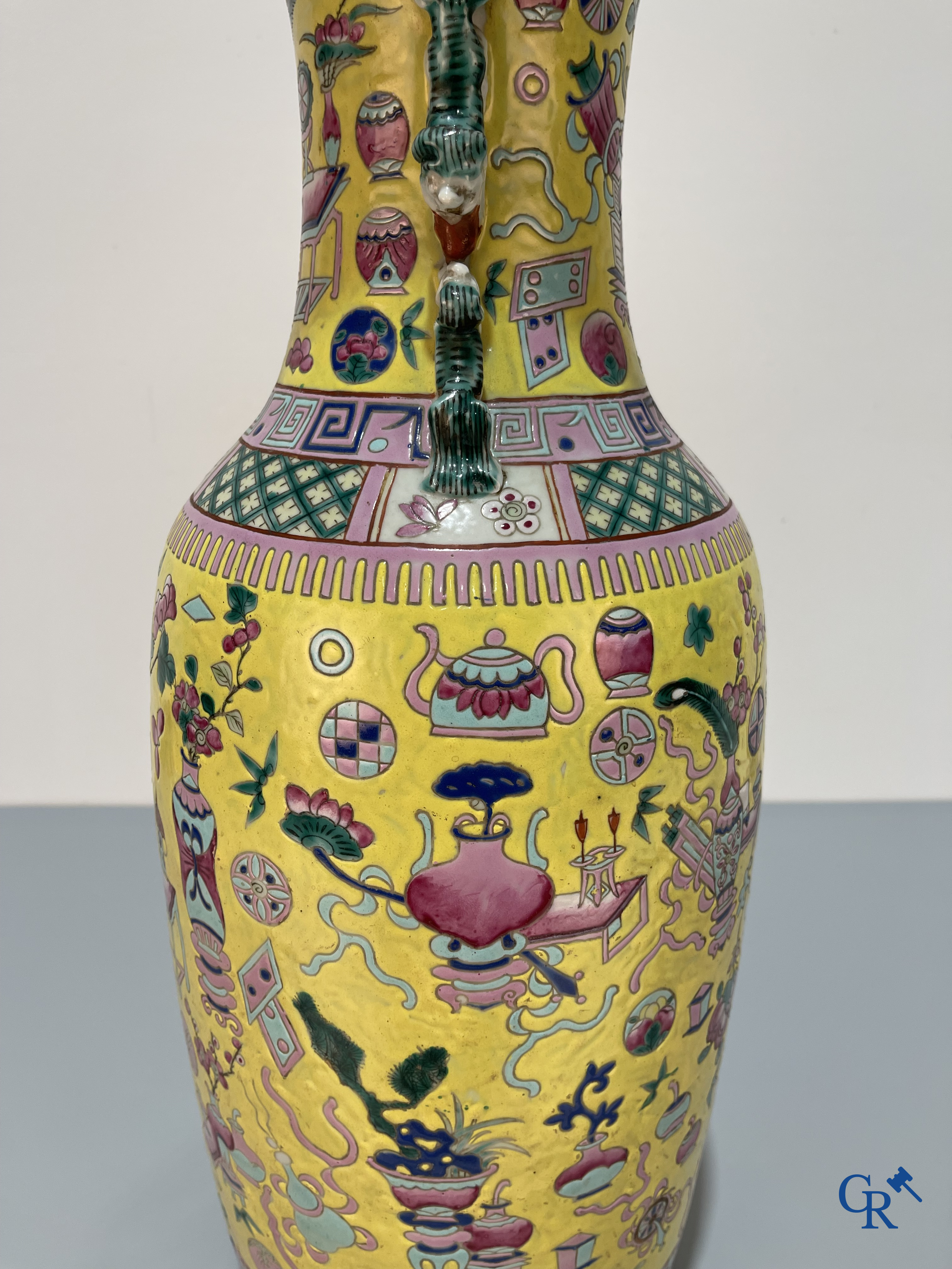 Asian Art, Chinese porcelain, a large Chinese famille jaune and rose vase with a decor of antiques. 19th century.