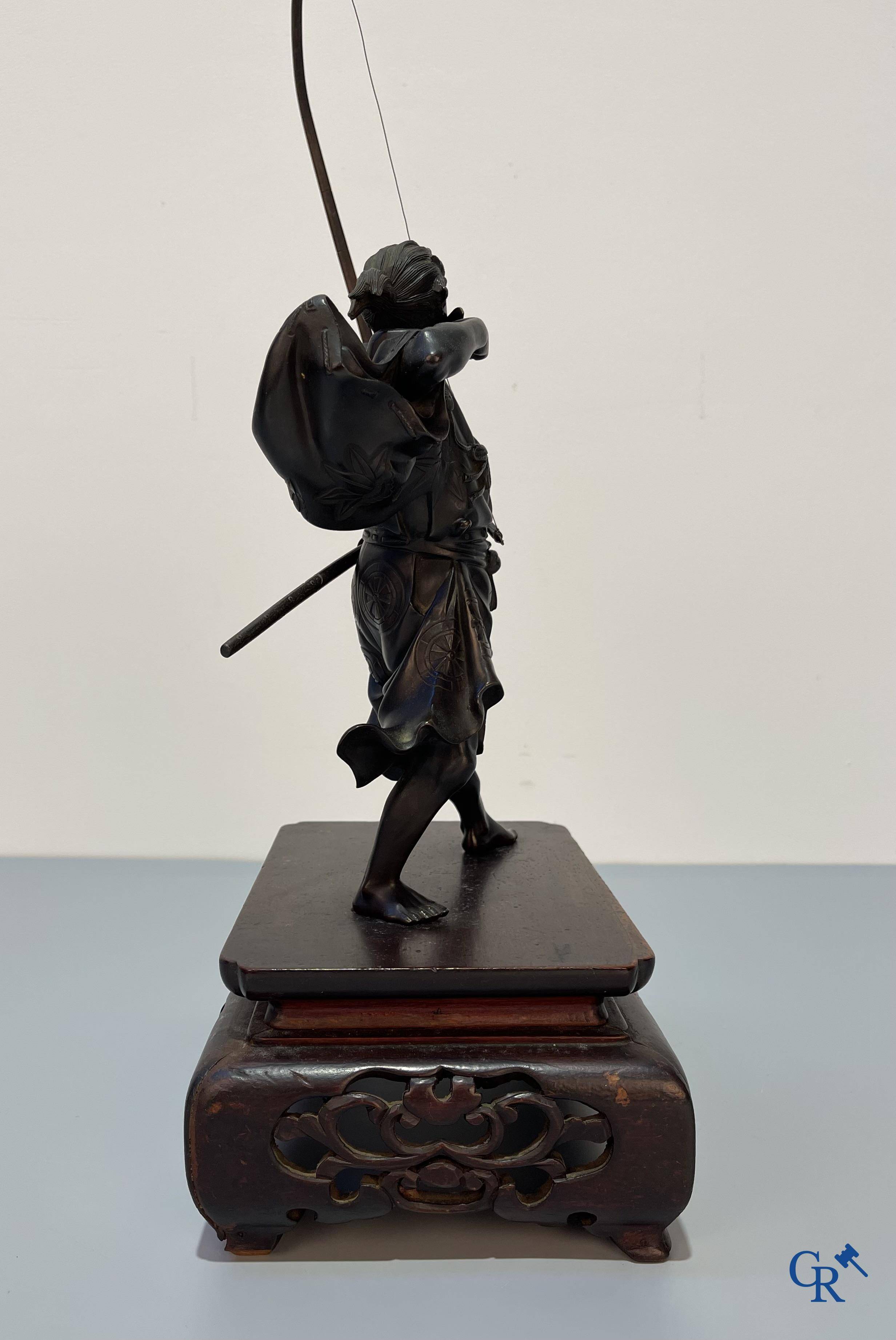 Asian Art, Japanese art, a bronze representation of a Samurai archer. Signed. Meiji period.