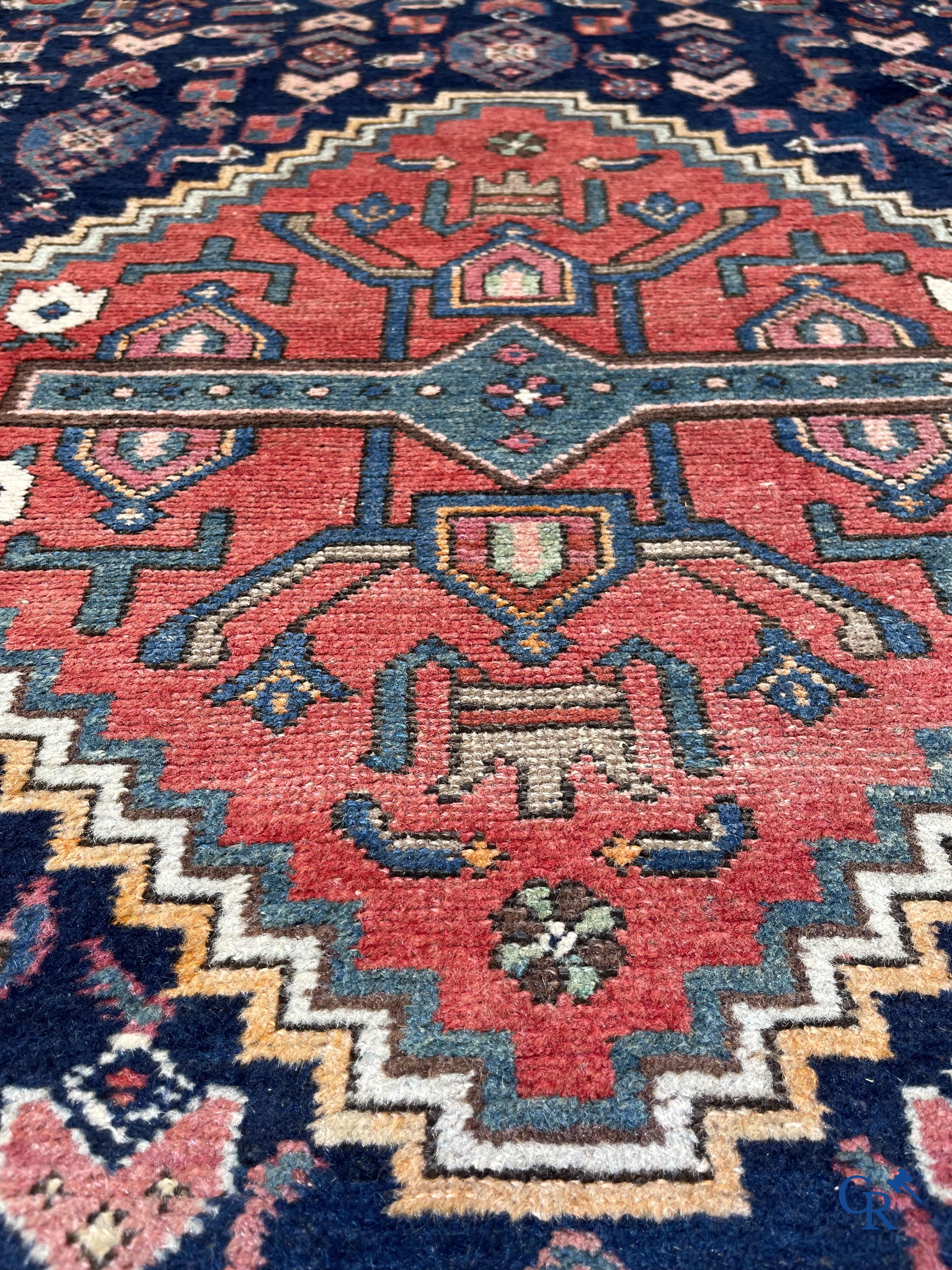 Oriental carpets, 2 antique hand-knotted Oriental carpets.