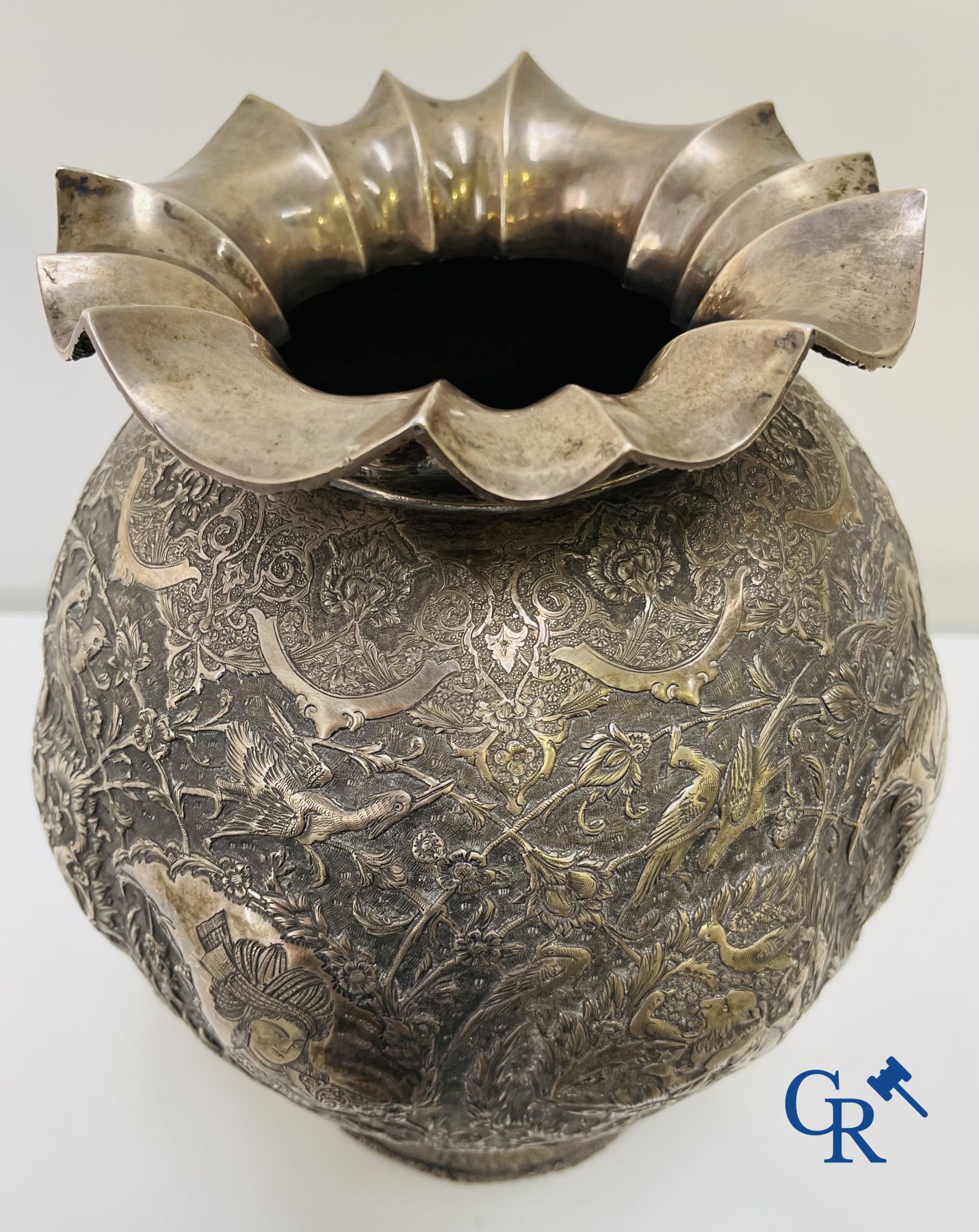 Silver: Vase in silver (Iran?) with a fine decor of birds, forest animals and characters.