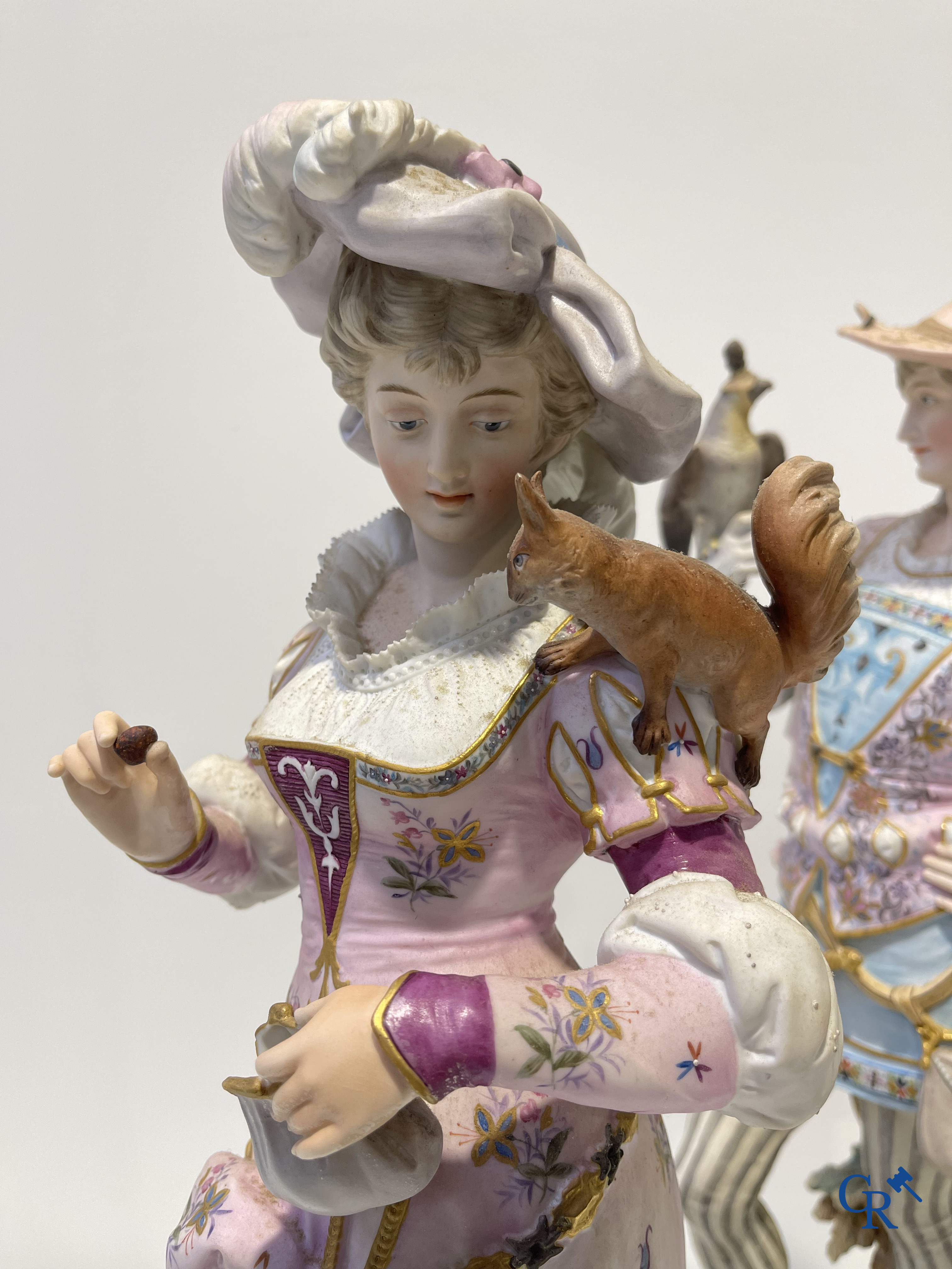 Exceptional pair of large statues in coloured and gilded biscuit porcelain. 2nd half of the 19th century.